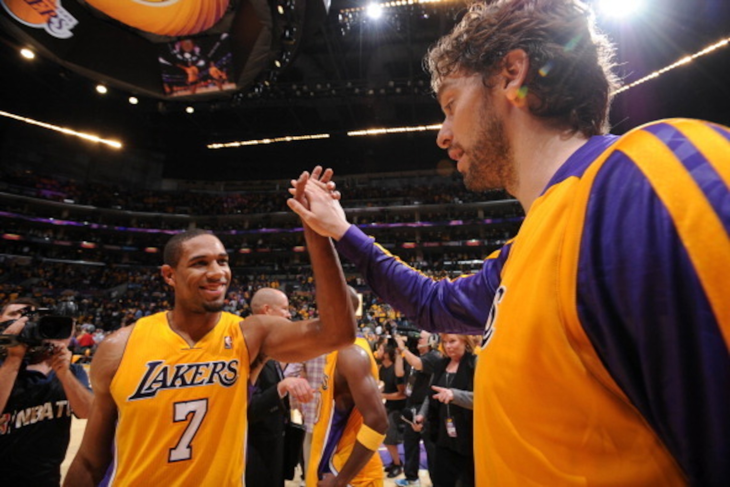 LOS ANGELES, CA - OCTOBER 29: Xavier Henry #7 and Pau Gasol #16 of the Los Angeles Lakers celebrate their team's victory over the Los Angeles Clippers at Staples Center on October 29, 2013 in Los Angeles, California. NOTE TO USER: User expressly acknowled