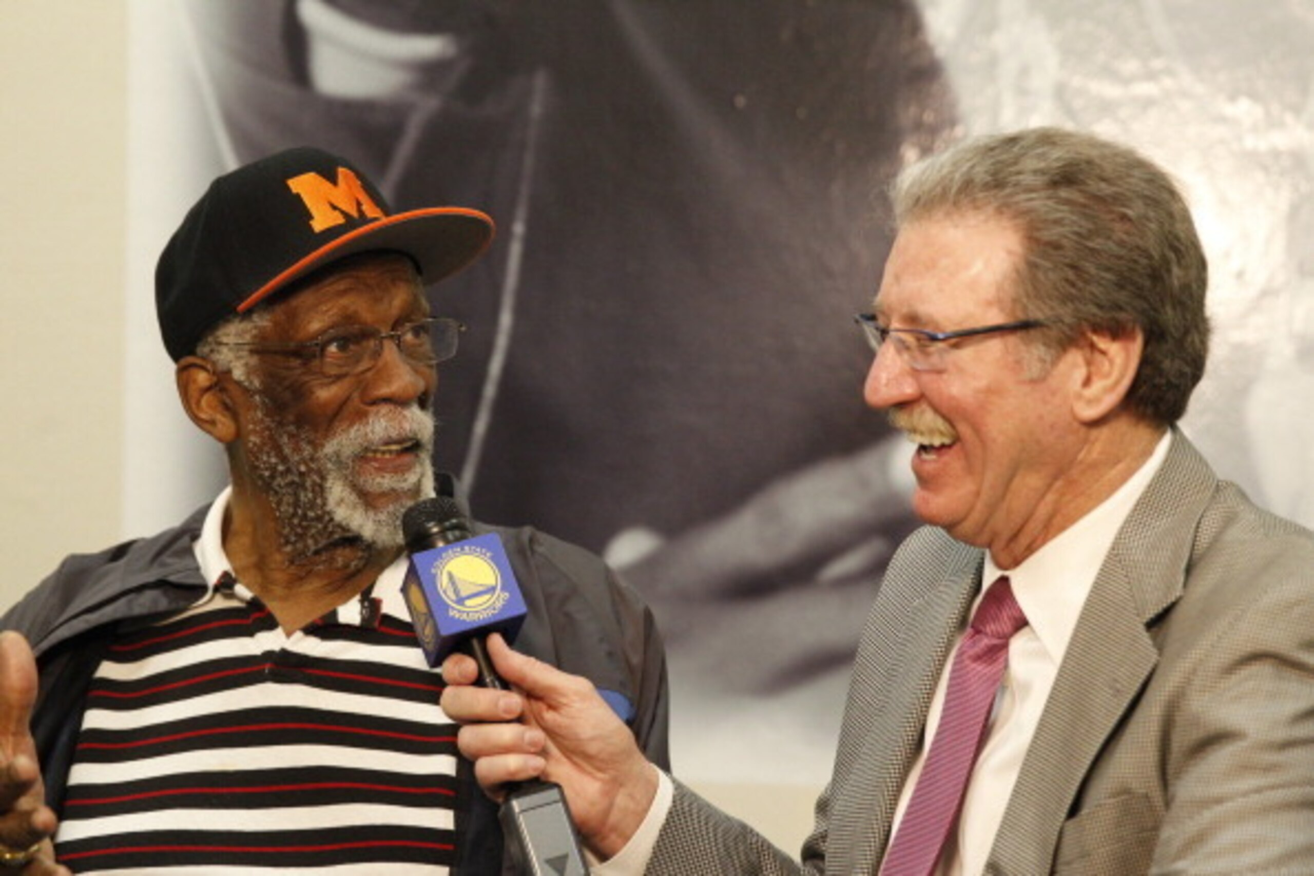 OAKLAND, CA - MARCH 26: Hall of Fame basketball player Bill Russell speaks with commentator Jim Barnett on March 26, 2013 at McClymonds High School in Oakland, California. NOTE TO USER: User expressly acknowledges and agrees that, by downloading and or us