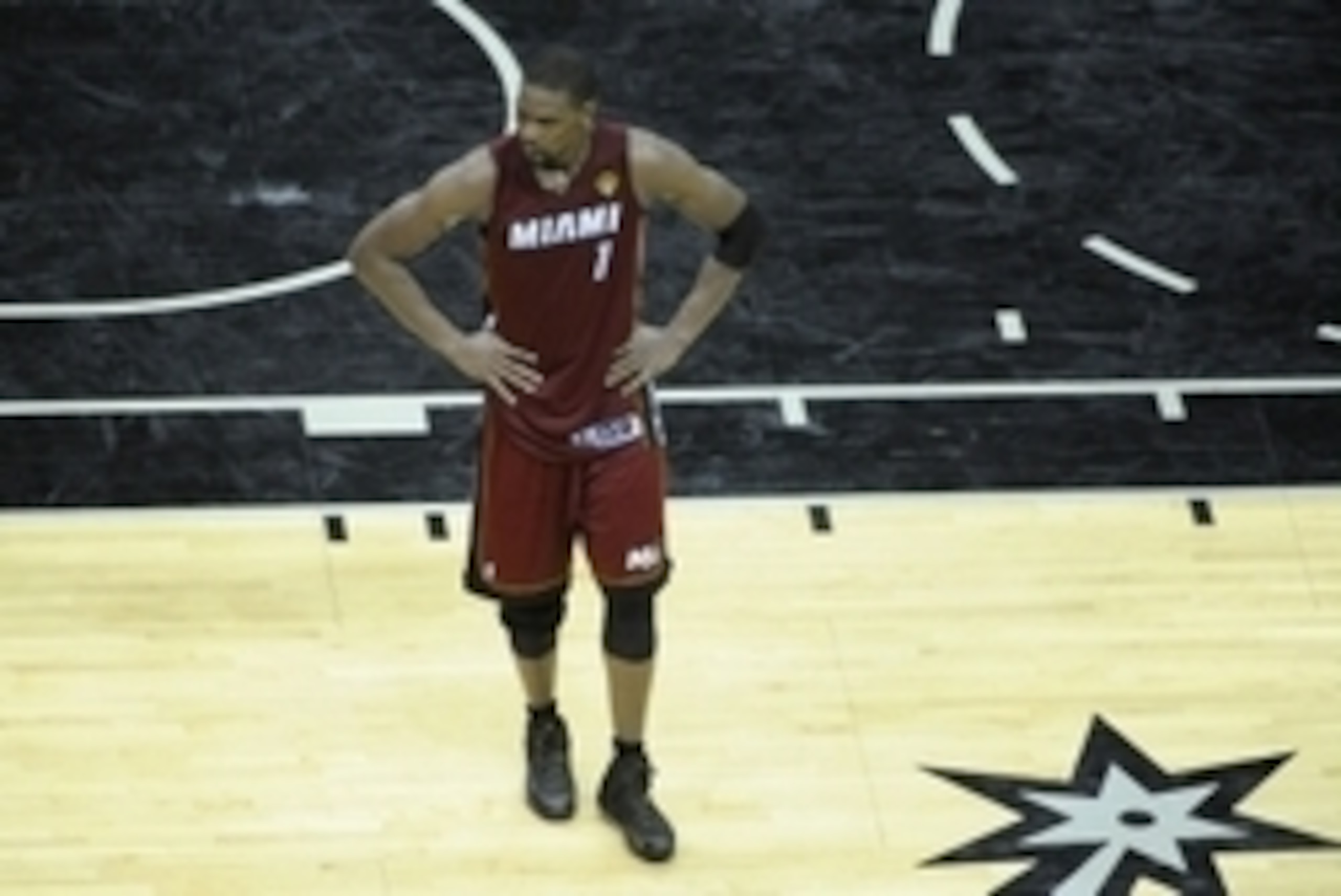 Jun 5, 2014; San Antonio, TX, USA; Miami Heat forward Chris Bosh (1) reacts in the fourth quarter against the San Antonio Spurs in game one of the 2014 NBA Finals at AT&T Center. The Spurs beat the Heat 110-95. Mandatory Credit: Brendan Maloney-USA TODAY 