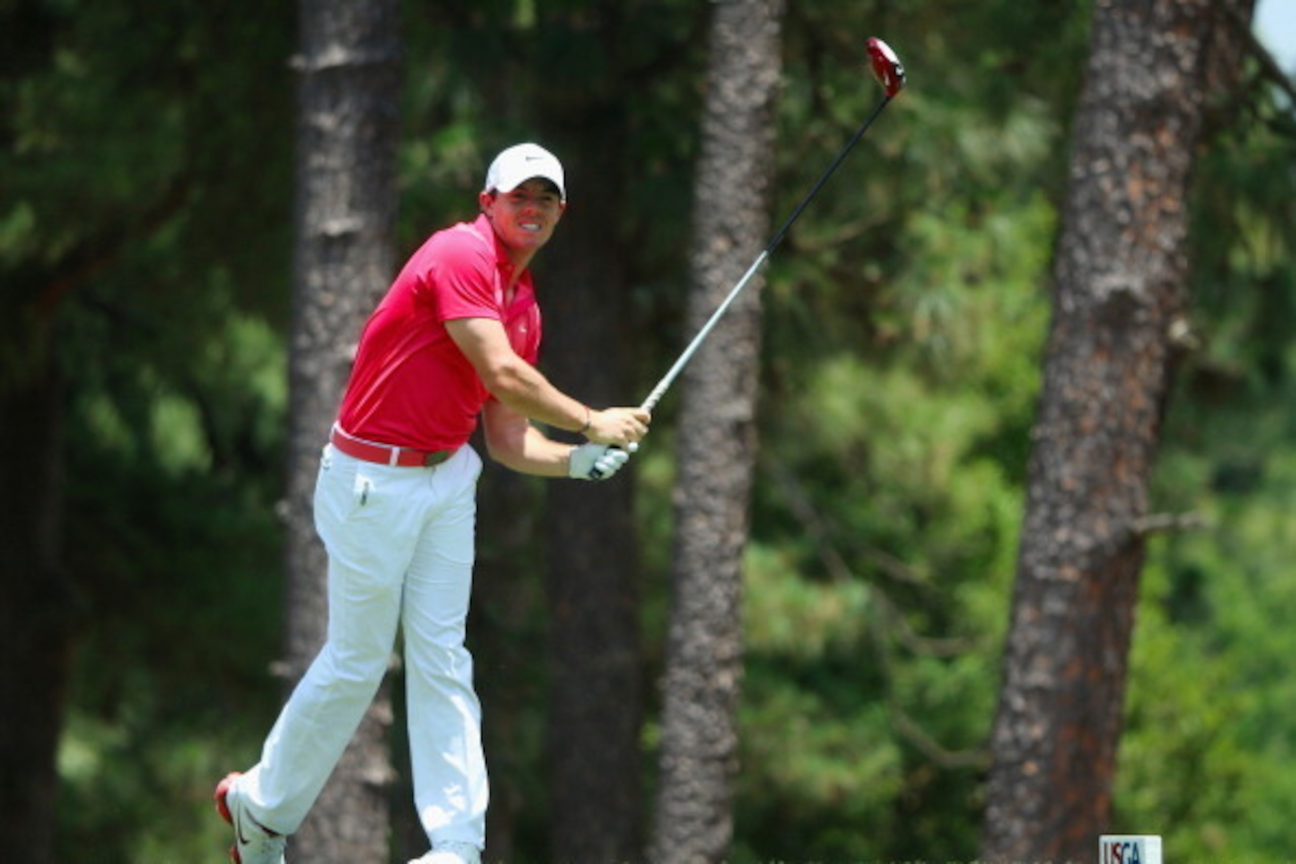 PINEHURST, NC - JUNE 13:  Rory McIlroy of Northern Ireland hits his tee shot on the 11th hole during the second round of the 114th U.S. Open at Pinehurst Resort & Country Club, Course No. 2 on June 13, 2014 in Pinehurst, North Carolina.  (Photo by Andrew 