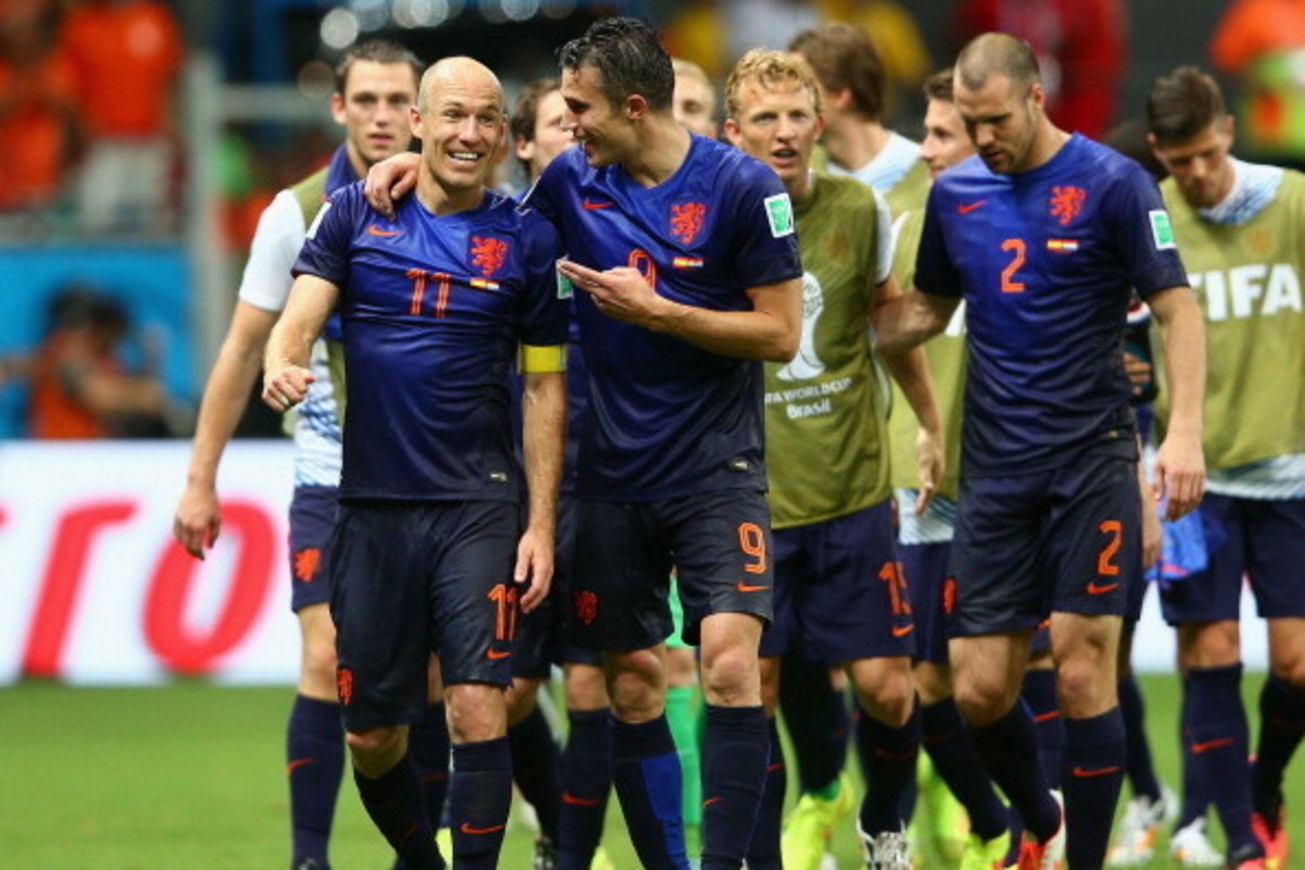 SALVADOR, BRAZIL - JUNE 13:  Arjen Robben and Robin van Persie of the Netherlands celebrate victory after the 2014 FIFA World Cup Brazil Group B match between Spain and Netherlands at Arena Fonte Nova on June 13, 2014 in Salvador, Brazil.  (Photo by Dean 