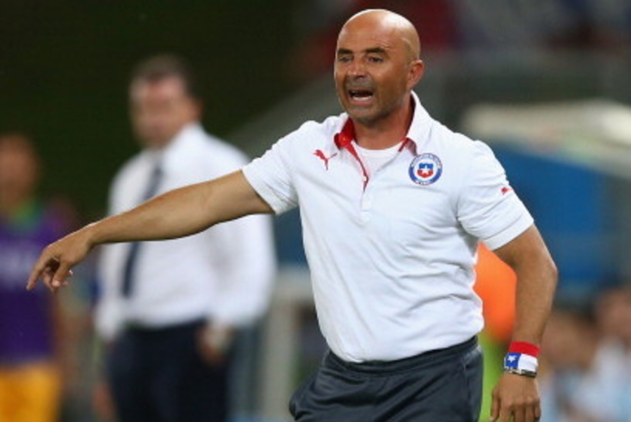 CUIABA, BRAZIL - JUNE 13: Head coach Jorge Sampaoli of Chile reacts on the sidelines during the 2014 FIFA World Cup Brazil Group B match between Chile and Australia at Arena Pantanal on June 13, 2014 in Cuiaba, Brazil.  (Photo by Clive Brunskill/Getty Ima
