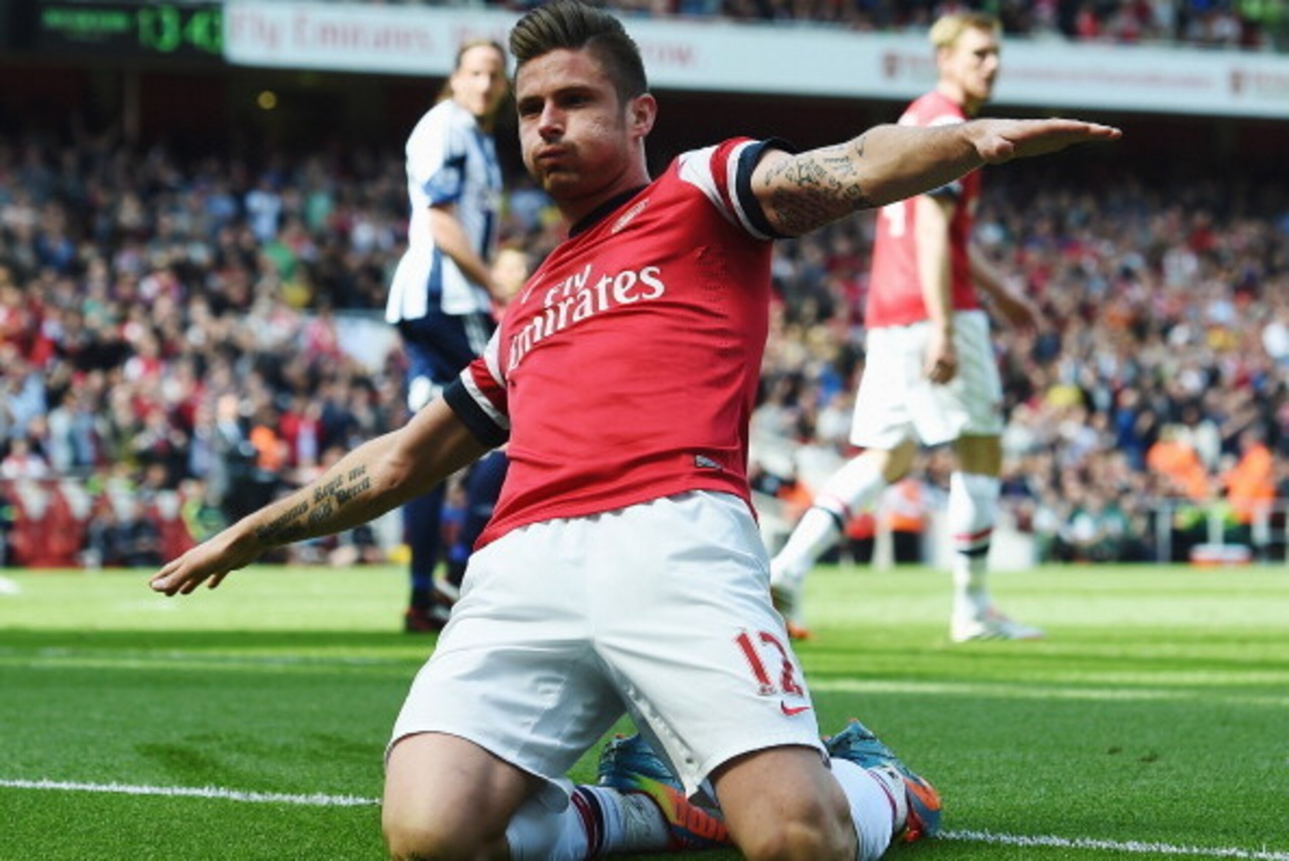 LONDON, ENGLAND - MAY 04:  Olivier Giroud of Arsenal after scoring during the Barclays Premier League match between Arsenal and West Bromwich Albion at the Emirates Stadium on May 4, 2014 in London, England.  (Photo by Shaun Botterill/Getty Images)