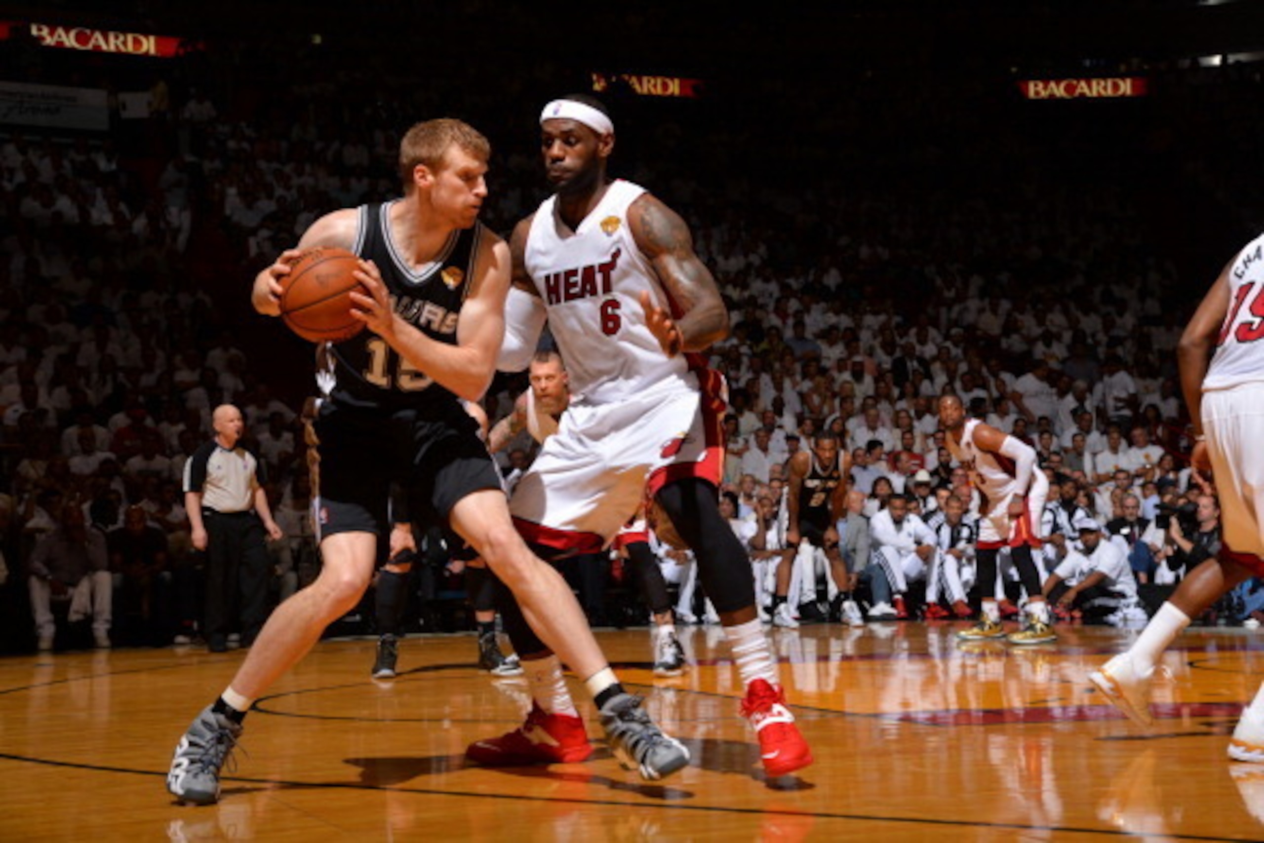 MIAMI, FL - JUNE 12: Matt Bonner #15 of the San Antonio Spurs looks to pass the ball against the Miami Heat during Game Six of the 2014 NBA Finals on June 12, 2014 at American Airlines Arena in Miami, Florida. NOTE TO USER: User expressly acknowledges and