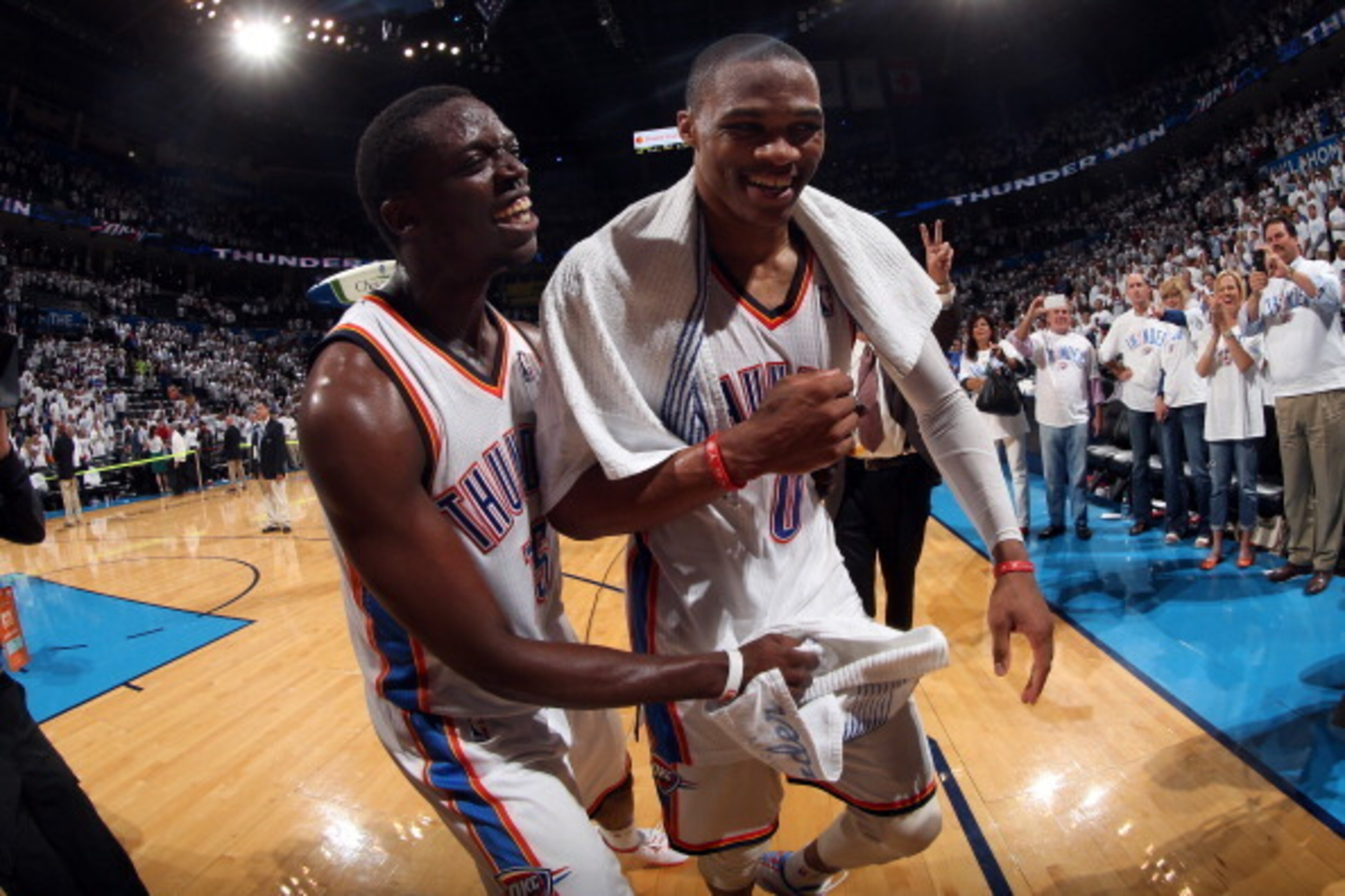OKLAHOMA CITY, OK - MAY 13: Reggie Jackson #15 and Russell Westbrook #0 of the Oklahoma City Thunder after the game against the Los Angeles Clippers in Game Five of the Western Conference Semifinals during the 2014 NBA Playoffs on May 13, 2014 at the Ches
