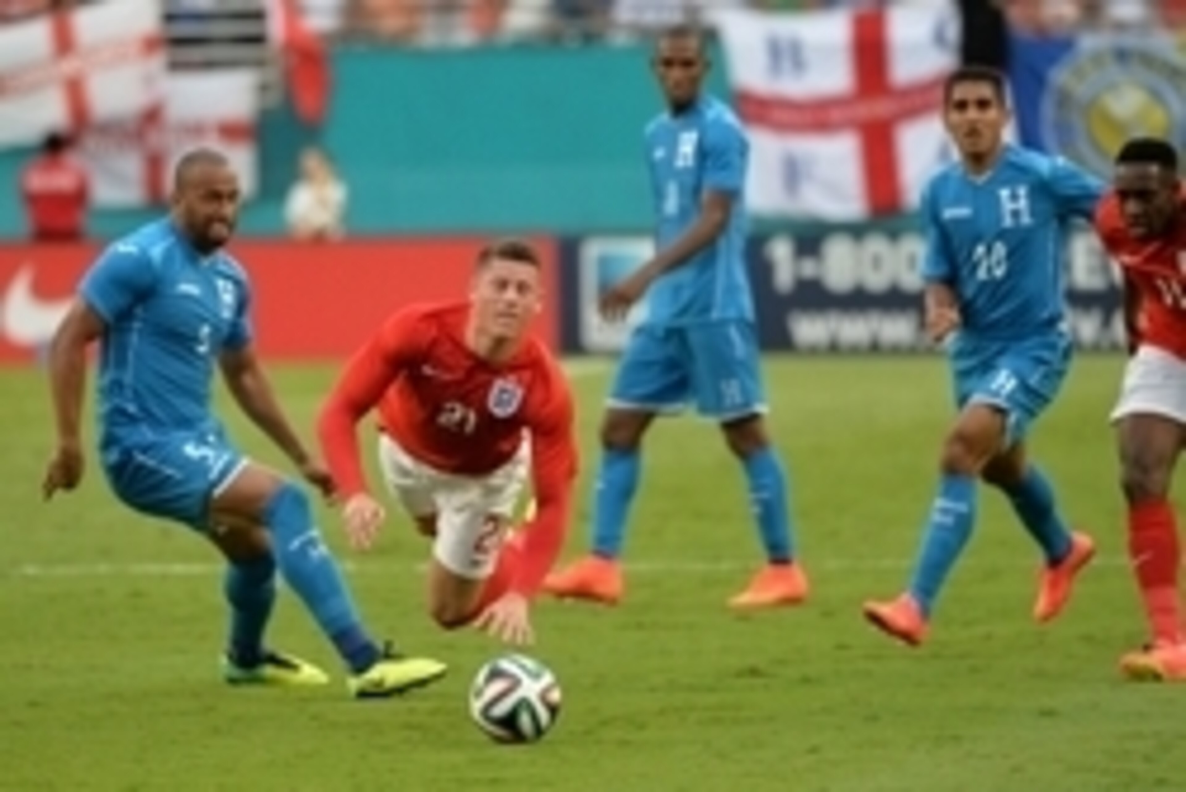 Jun 7, 2014; Miami Gardens, FL, USA; England defender Gary Cahill (5) is tripped by Honduras defender Victor Bernardez (5) during the second half at Sun Life Stadium. Mandatory Credit: Steve Mitchell-USA TODAY Sports Jun 7, 2014; Miami Gardens, FL, USA; England defender Gary Cahill (5) is tripped by Honduras defender Victor Bernardez (5) during the second half at Sun Life Stadium. Mandatory Credit: Steve Mitchell-USA TODAY Sports