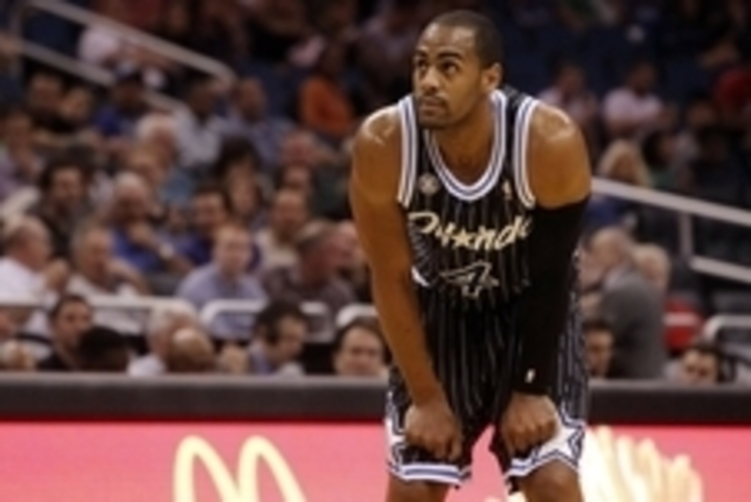 Feb 5, 2014; Orlando, FL, USA; Orlando Magic shooting guard Arron Afflalo (4) looks up against the Detroit Pistons during the first quarter at Amway Center. Mandatory Credit: Kim Klement-USA TODAY Sports