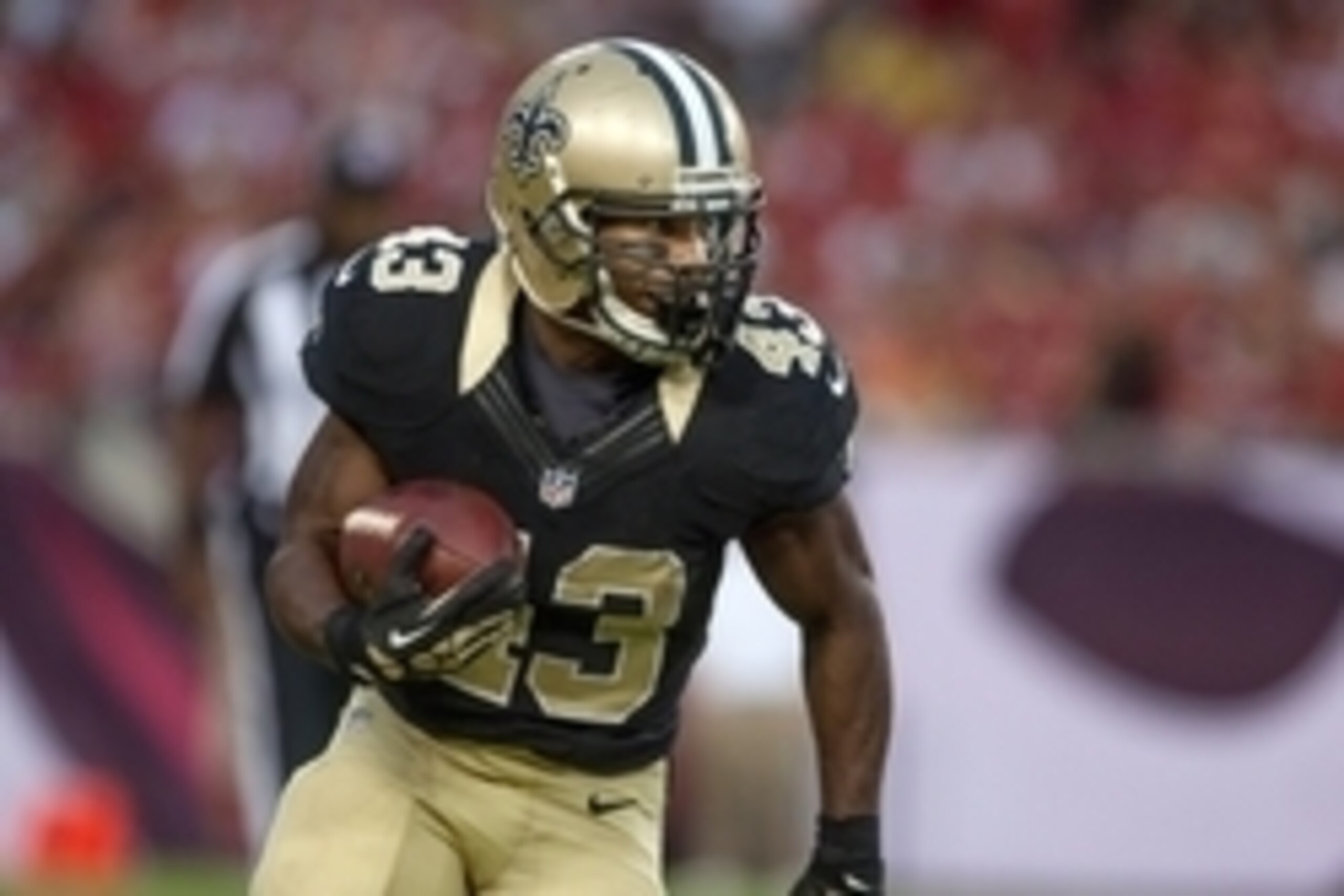 Sep 15, 2013; Tampa, FL, USA; New Orleans Saints running back Darren Sproles (43) rushes with the ball during the game against the Tampa Bay Buccaneers at Raymond James Stadium. Mandatory Credit: Rob Foldy-USA TODAY Sports
