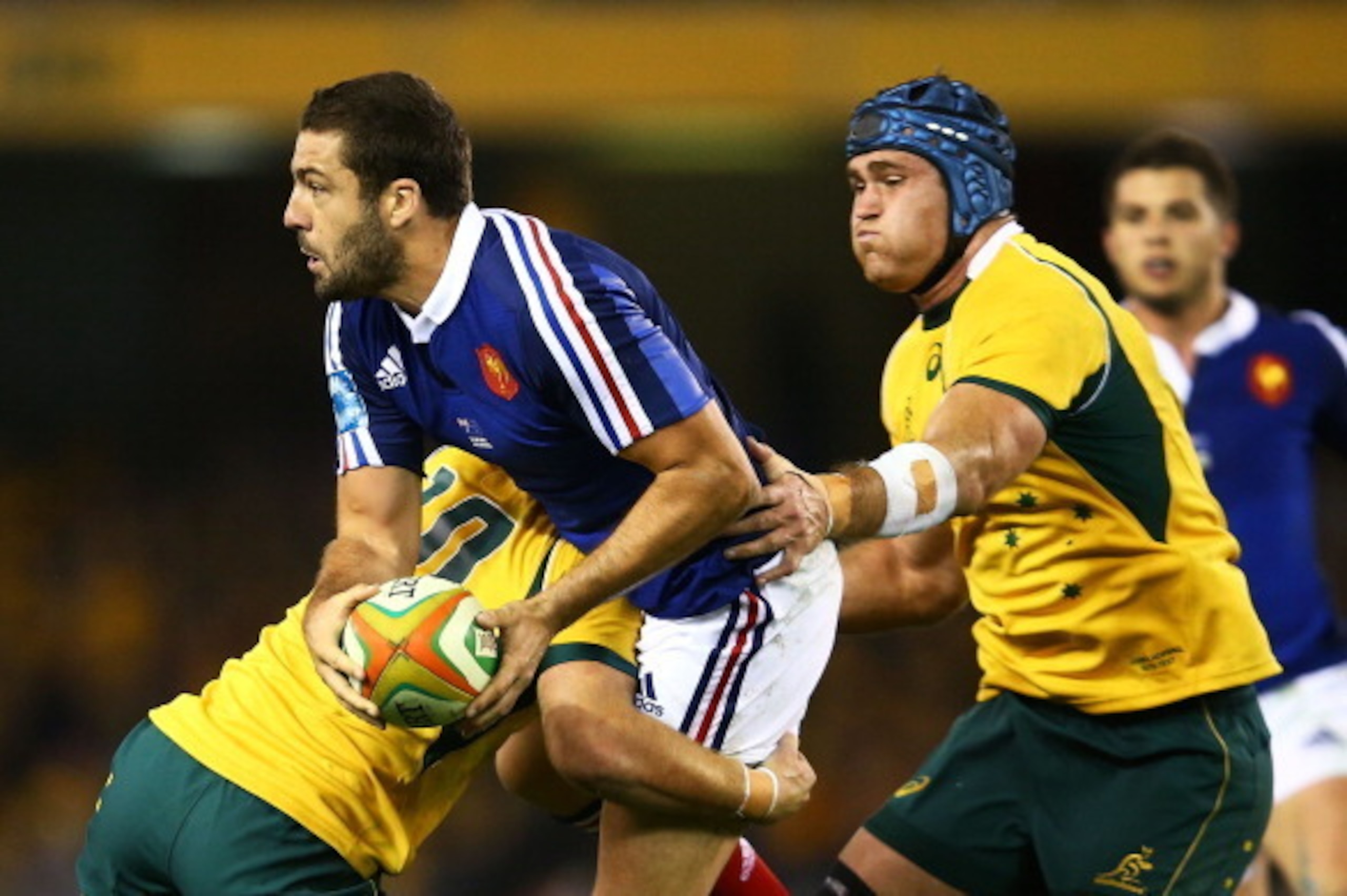 MELBOURNE, AUSTRALIA - JUNE 14: Remi Tales of France is tackled during the second International Test Match between the Australian Wallabies and France at Etihad Stadium on June 14, 2014 in Melbourne, Australia. (Photo by Mark Nolan/Getty Images) MELBOURNE, AUSTRALIA - JUNE 14: Remi Tales of France is tackled during the second International Test Match between the Australian Wallabies and France at Etihad Stadium on June 14, 2014 in Melbourne, Australia. (Photo by Mark Nolan/Getty Images)