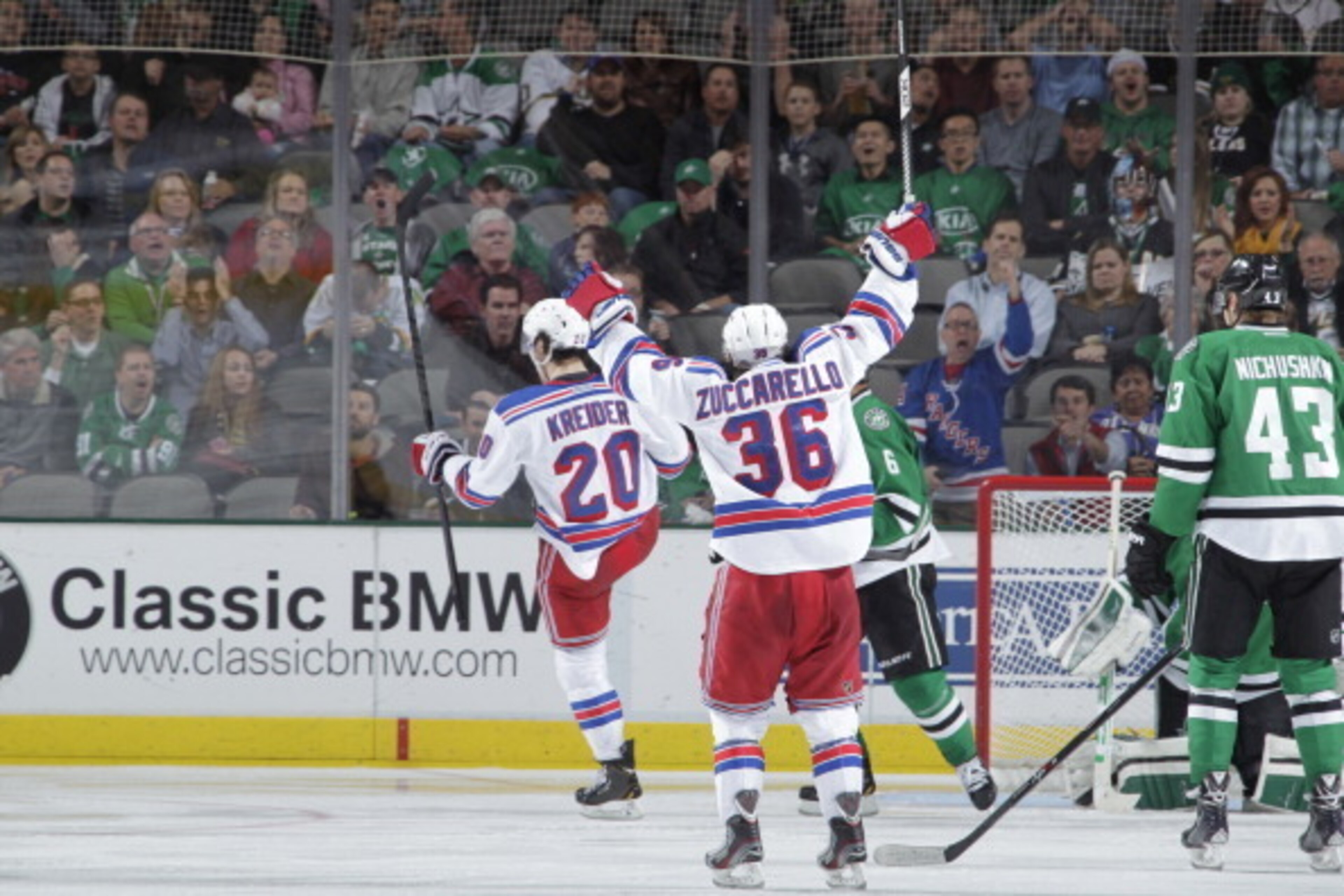 DALLAS, TX - NOVEMBER 21:  Mats Zuccarello #36 and Chris Kreider #20 and the New York Rangers celebrate a goal against the Dallas Stars at the American Airlines Center on November 21, 2013 in Dallas, Texas. (Photo by Glenn James/NHLI via Getty Images)