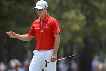 PINEHURST, NC - JUNE 11: Zach Johnson of the United States reacts on a green during a practice round prior to the start of the 114th U.S. Open at Pinehurst Resort & Country Club, Course No. 2 on June 11, 2014 in Pinehurst, North Carolina.  (Photo by Ross 