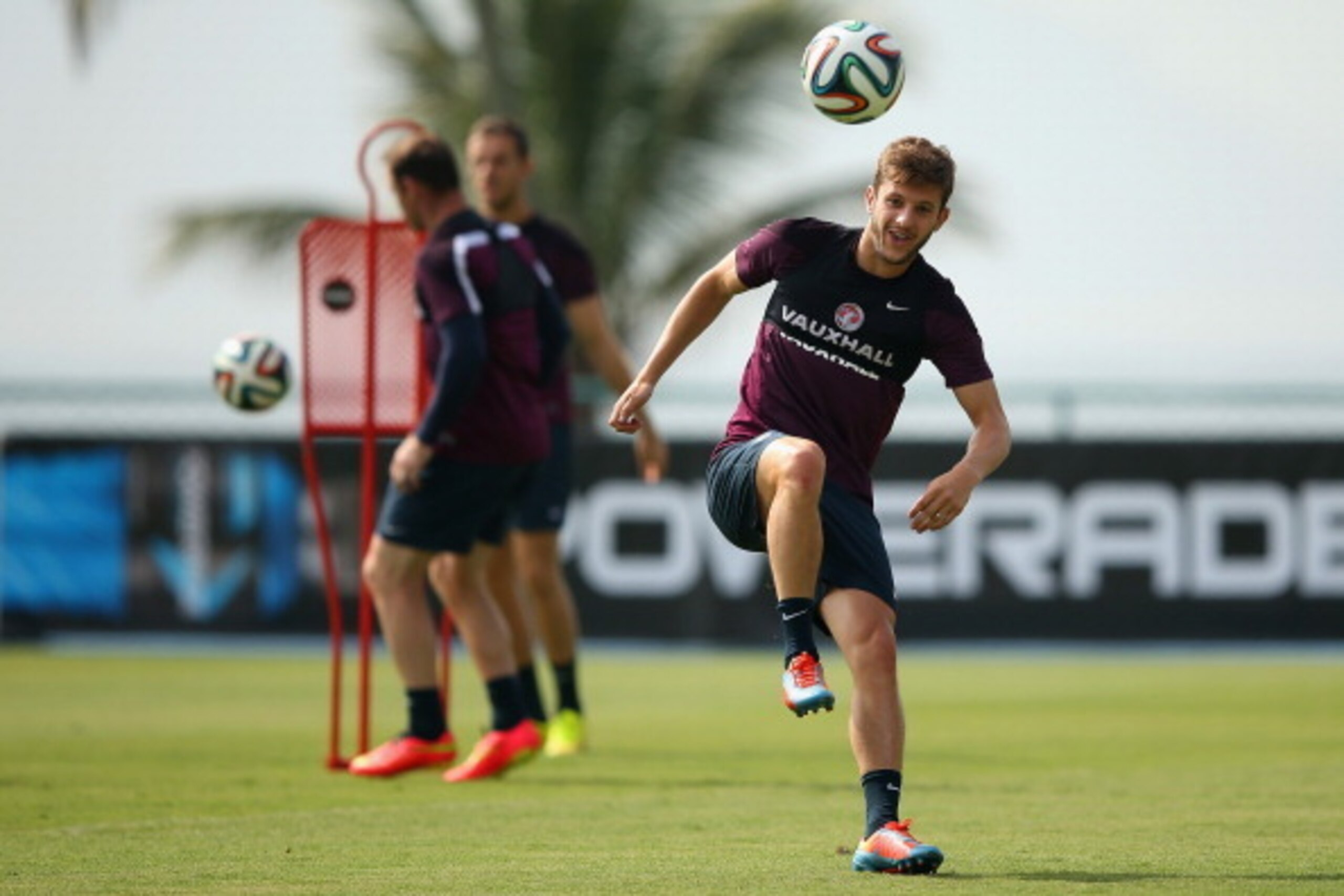 RIO DE JANEIRO, BRAZIL - JUNE 11: Adam Lallana of England juggles the ball during a training session at the Urca military base (Forte de Urca) training ground on June 11, 2014 in Rio de Janeiro, Brazil.  (Photo by Richard Heathcote/Getty Images)