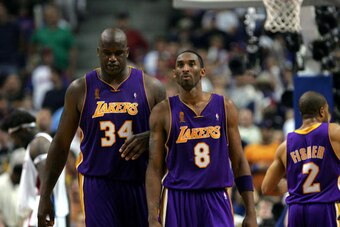 AUBURN HILLS, MI - JUNE 13:  Shaquille O'Neal #34 and Kobe Bryant #8 of the Los Angeles Lakers play against the Detroit Pistons in Game four of the 2004 NBA Finals on June 13, 2004 at The Palace of Auburn Hills in Auburn Hills, Michigan.  NOTE TO USER: Us