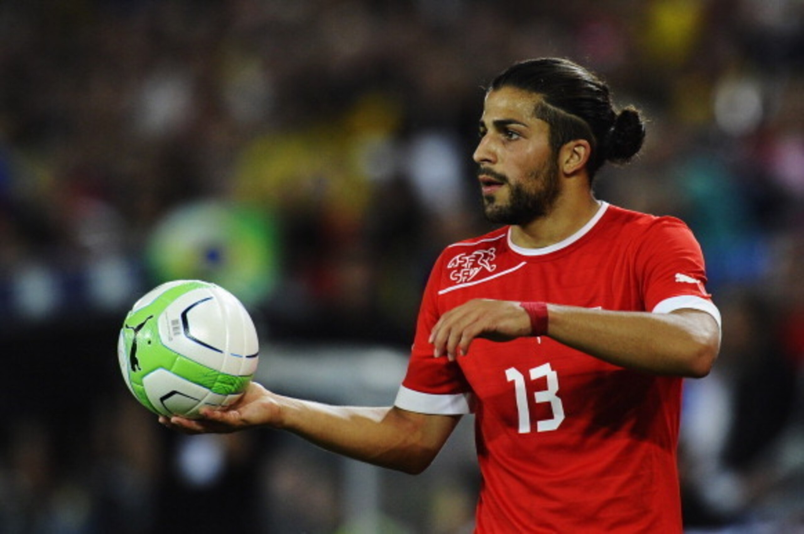 BASEL, SWITZERLAND - AUGUST 14: Ricardo Rodriguez of Switzerland holds a ball during the international friendly match between Switzerland and Brazil at St. Jakob Stadium on August 14, 2013 in Basel, Switzerland.  (Photo by Daniel Kopatsch/Getty Images)