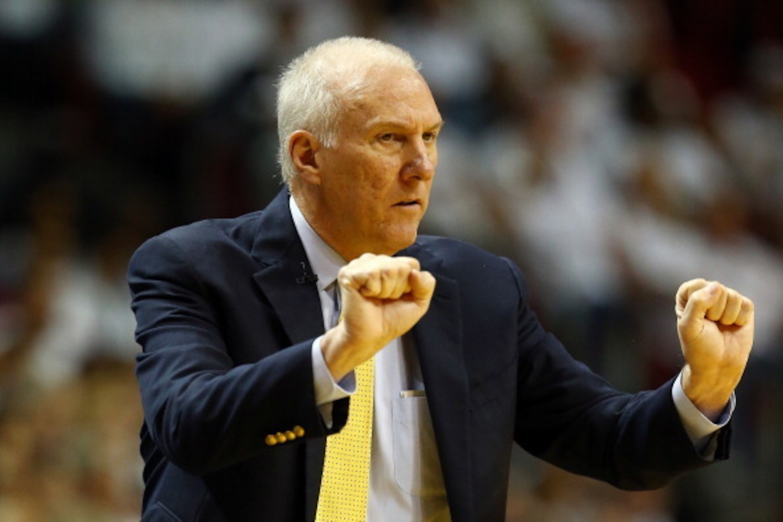 MIAMI, FL - JUNE 12:  Gregg Popovich of the San Antonio Spurs motions to his players against the Miami Heat during Game Four of the 2014 NBA Finals at American Airlines Arena on June 12, 2014 in Miami, Florida. NOTE TO USER: User expressly acknowledges an