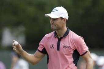 Jun 14, 2014; Pinehurst, NC, USA; Martin Kaymer acknowledges the crowd after making a putt on the 4th hole during the third round of the 2014 U.S. Open golf tournament at Pinehurst Resort Country Club - #2 Course. Mandatory Credit: Jason Getz-USA TODAY Sp