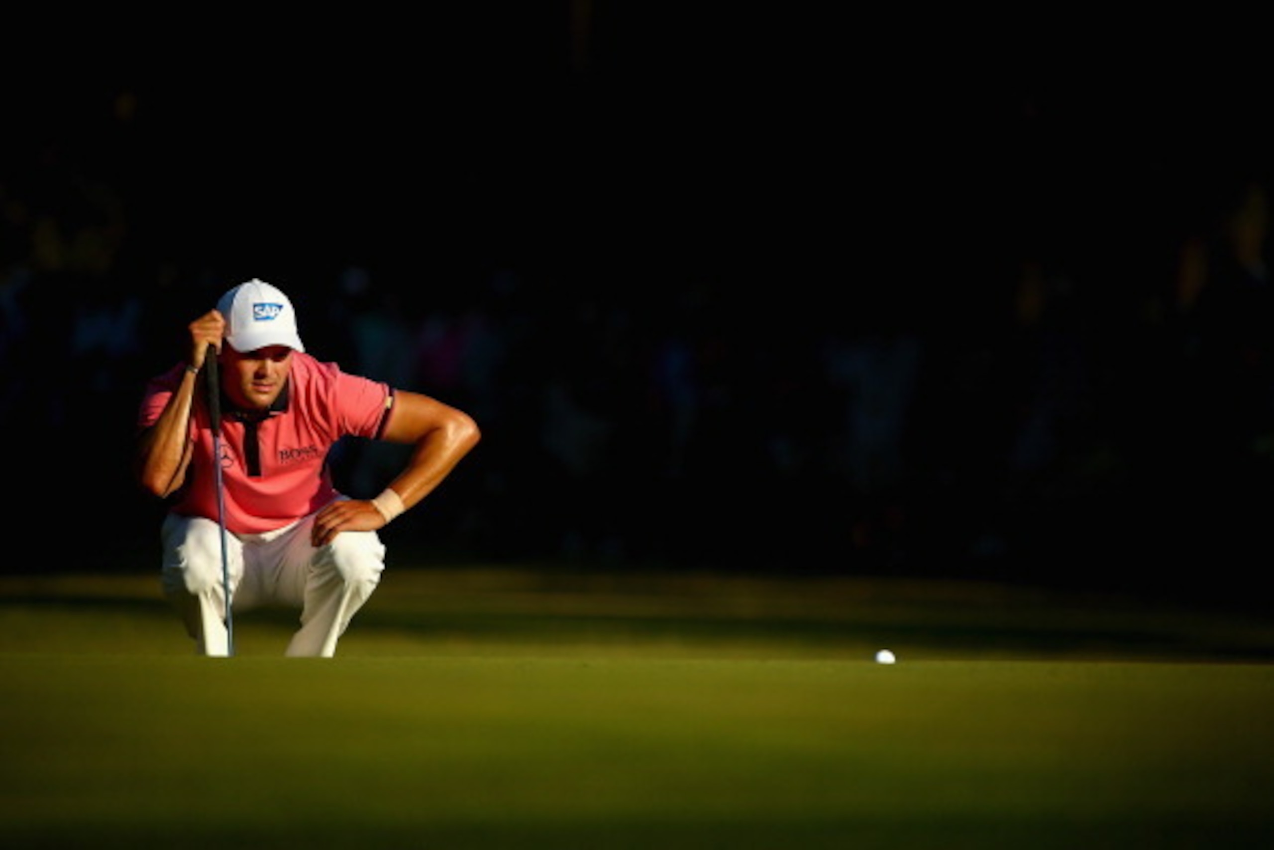 PINEHURST, NC - JUNE 14:  Martin Kaymer of Germany lines up his putt on the 15th green during the third round of the 114th U.S. Open at Pinehurst Resort & Country Club, Course No. 2 on June 14, 2014 in Pinehurst, North Carolina.  (Photo by Streeter Lecka/