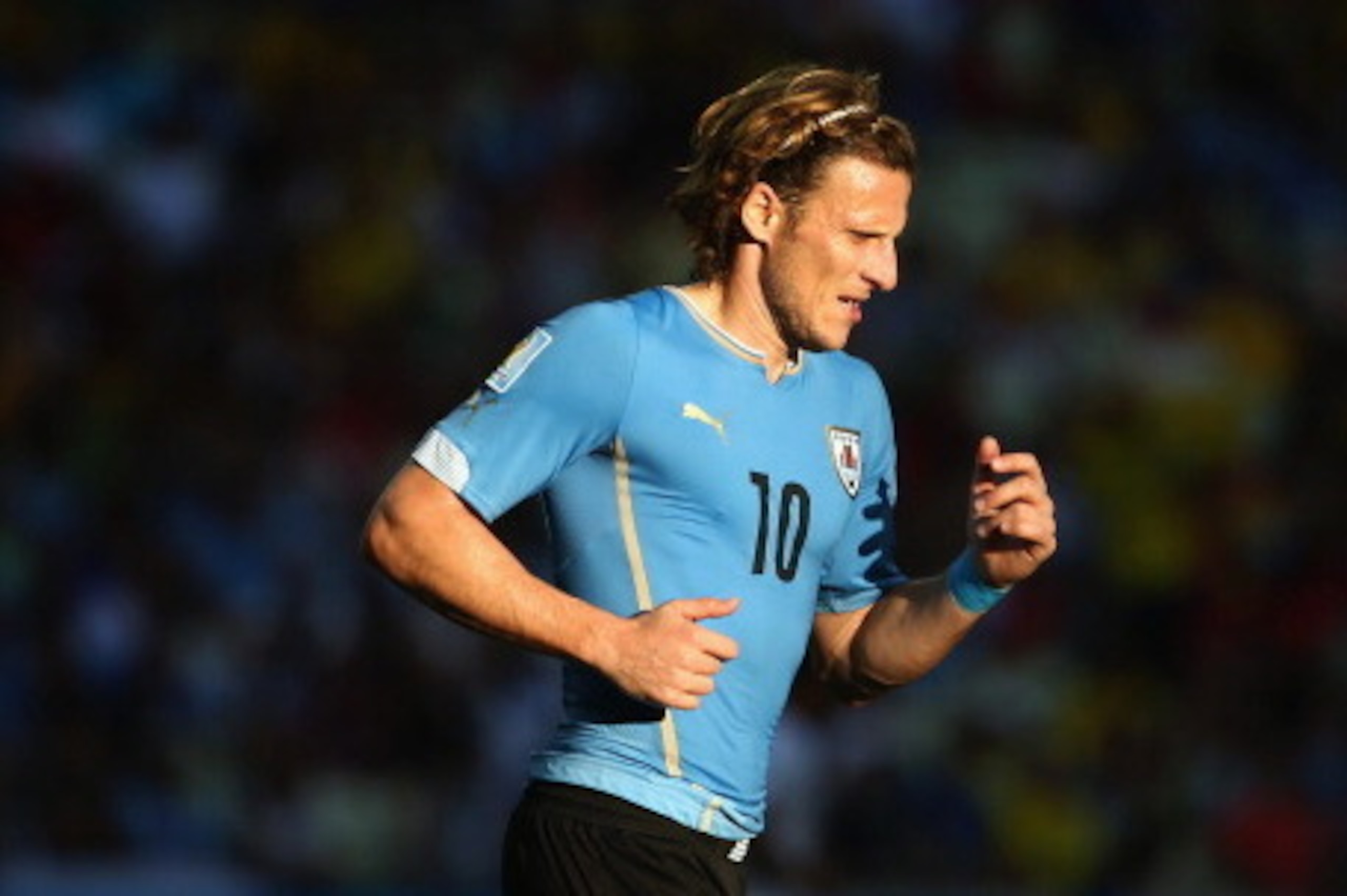 FORTALEZA, BRAZIL - JUNE 14:  Diego Forlan of Uruguay runs during the 2014 FIFA World Cup Brazil Group D match between Uruguay and Costa Rica at Castelao on June 14, 2014 in Fortaleza, Brazil.  (Photo by Robert Cianflone/Getty Images)