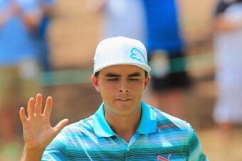 PINEHURST, NC - JUNE 14:  Rickie Fowler of the United States waves to the gallery on the fourth hole during the third round of the 114th U.S. Open at Pinehurst Resort & Country Club, Course No. 2 on June 14, 2014 in Pinehurst, North Carolina.  (Photo by D