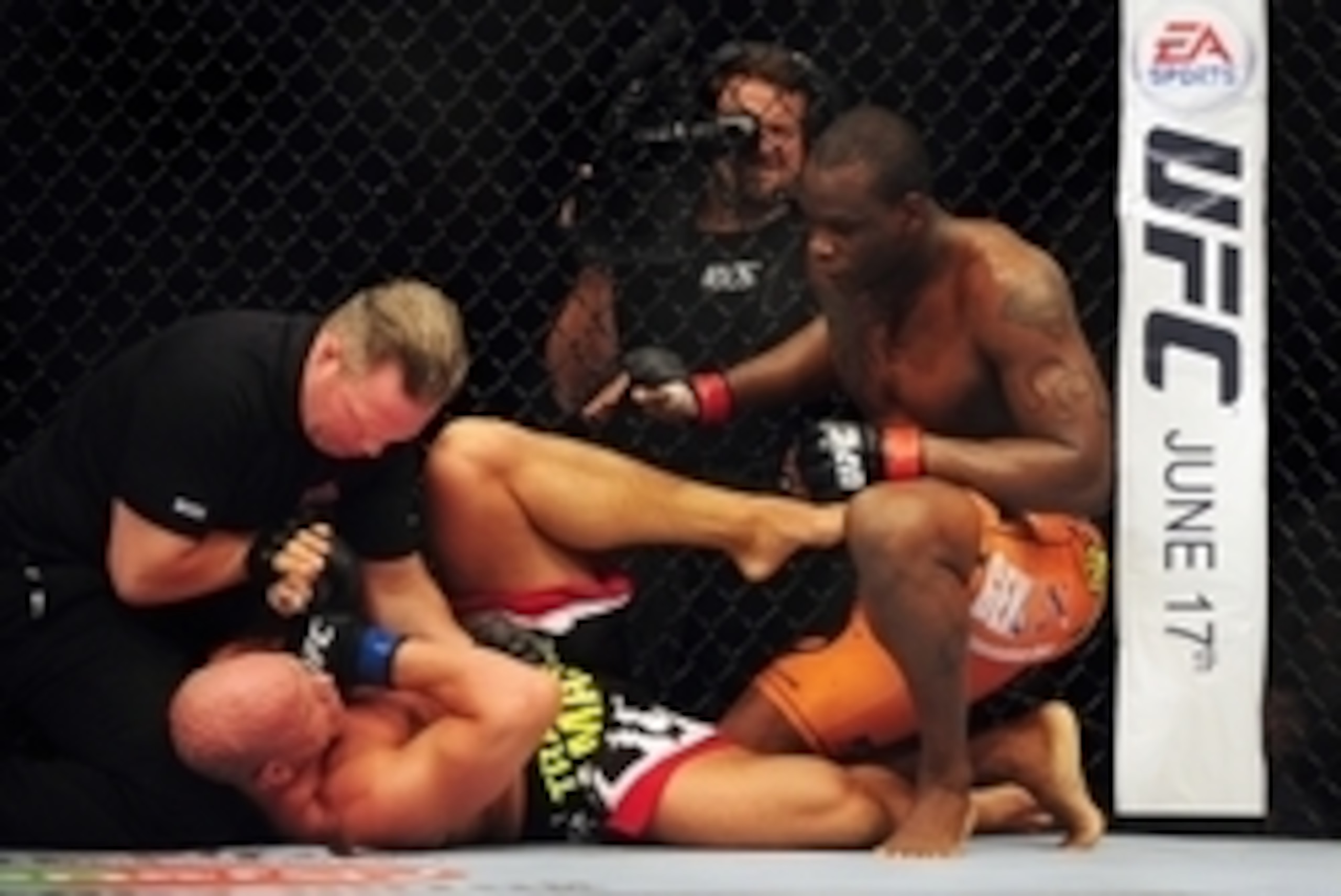 Jun 14, 2014; Vancouver, British Columbia, Canada; Ovince Saint Preux (red) defeats Ryan Jimmo (blue) in their light heavyweight bout for UFC 174 at Rogers Arena. Mandatory Credit: Anne-Marie Sorvin-USA TODAY Sports