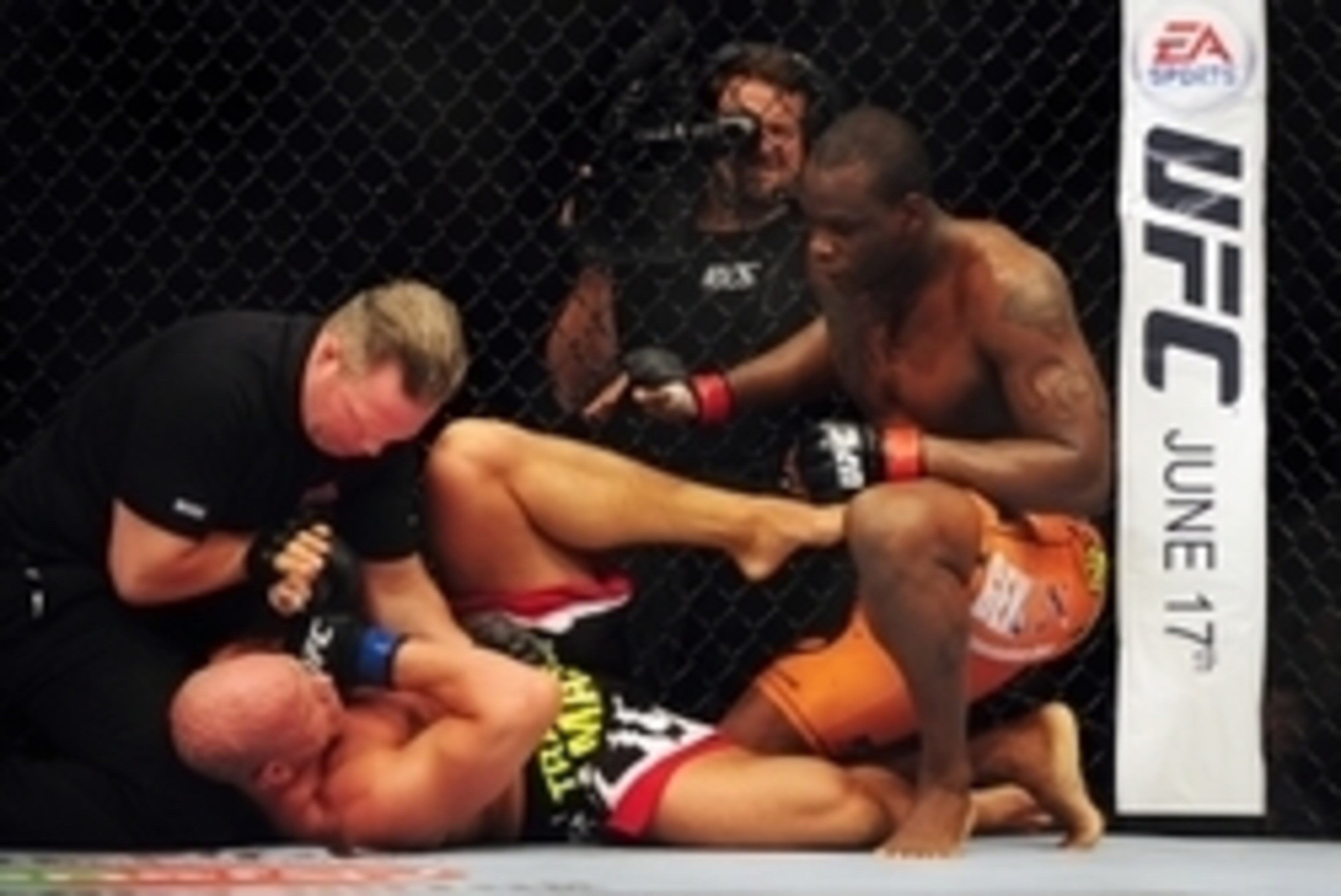 Jun 14, 2014; Vancouver, British Columbia, Canada; Ovince Saint Preux (red) defeats Ryan Jimmo (blue) in their light heavyweight bout for UFC 174 at Rogers Arena. Mandatory Credit: Anne-Marie Sorvin-USA TODAY Sports