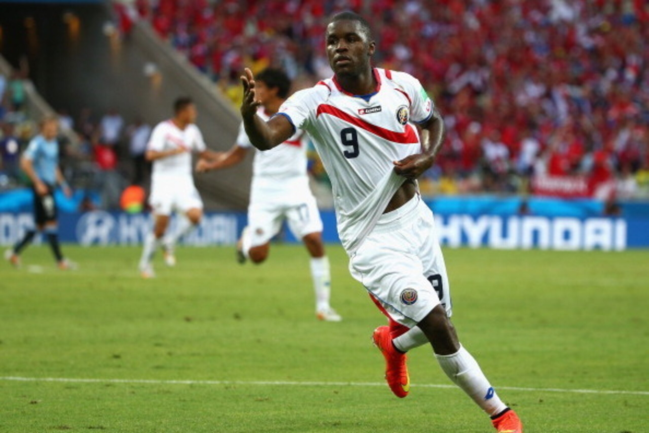 FORTALEZA, BRAZIL - JUNE 14:  Joel Campbell of Costa Rica celebrates scoring his team's first goal during the 2014 FIFA World Cup Brazil Group D match between Uruguay and Costa Rica at Castelao on June 14, 2014 in Fortaleza, Brazil.  (Photo by Robert Cian