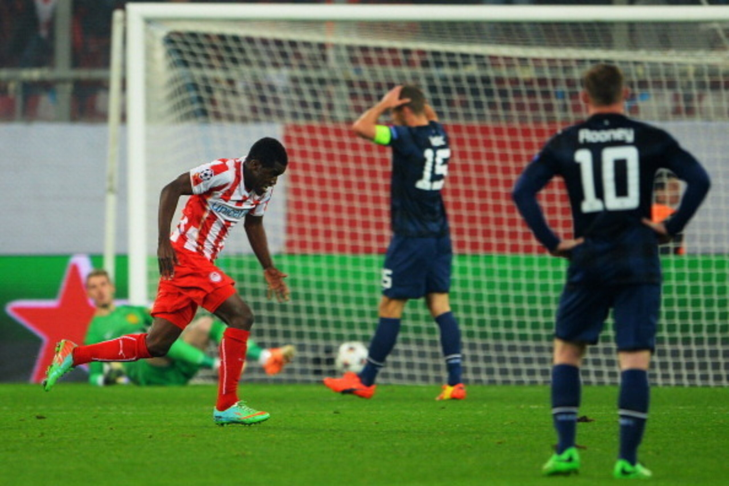PIRAEUS, GREECE - FEBRUARY 25:  Joel Campbell of Olympiacos celebrates scoring his sides second goal during the UEFA Champions League Round of 16 first leg match between Olympiacos FC and Manchester United at Karaiskakis Stadium on February 25, 2014 in Pi