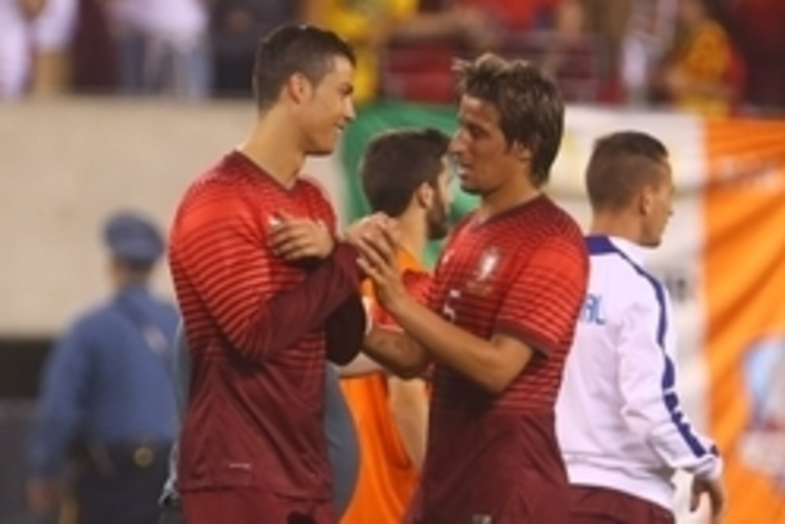 Jun 10, 2014; East Rutherford, NJ, USA; Portugal forward Cristiano Ronaldo (7) and Portugal defender Fabio Coentrao (5) celebrate Portugal's 5-1 win over Ireland at MetLife Stadium.  Mandatory Credit: Ed Mulholland-USA TODAY Sports