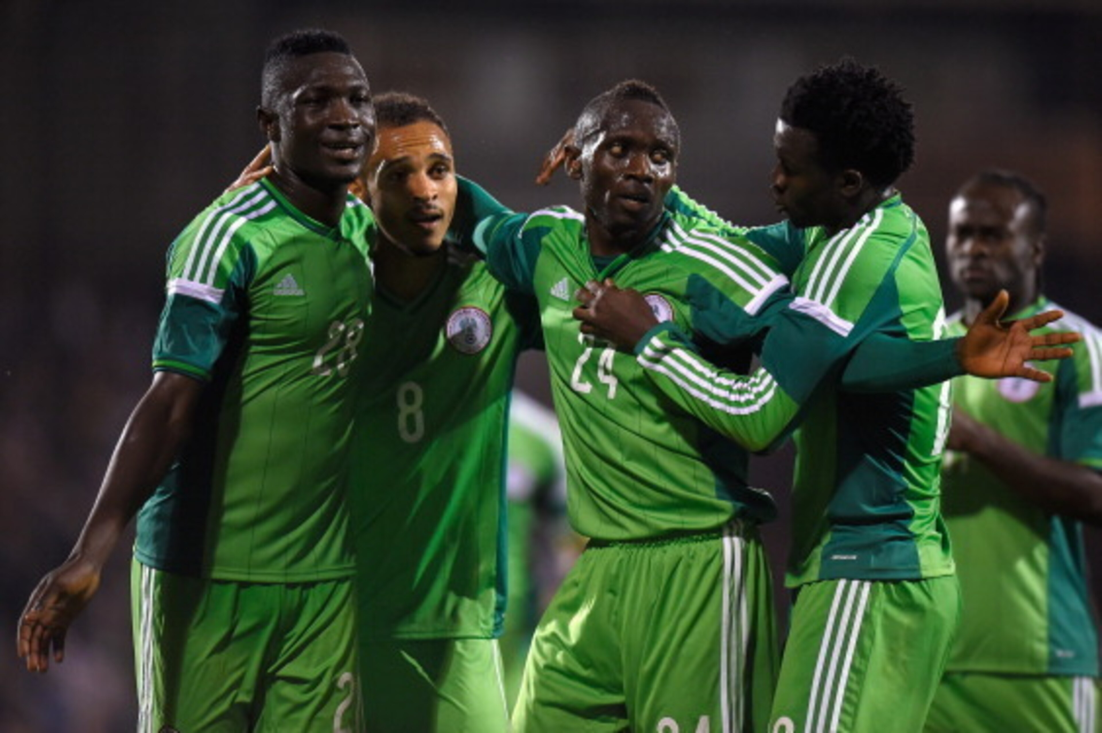 LONDON, ENGLAND - MAY 28:  Uche Nwofor of Nigeria (2nd R) celebrates with team mates after equalising in the last minute during an International Friendly between Scotland and Nigeria at Craven Cottage on May 28, 2014 in London, United Kingdom.  (Photo by 