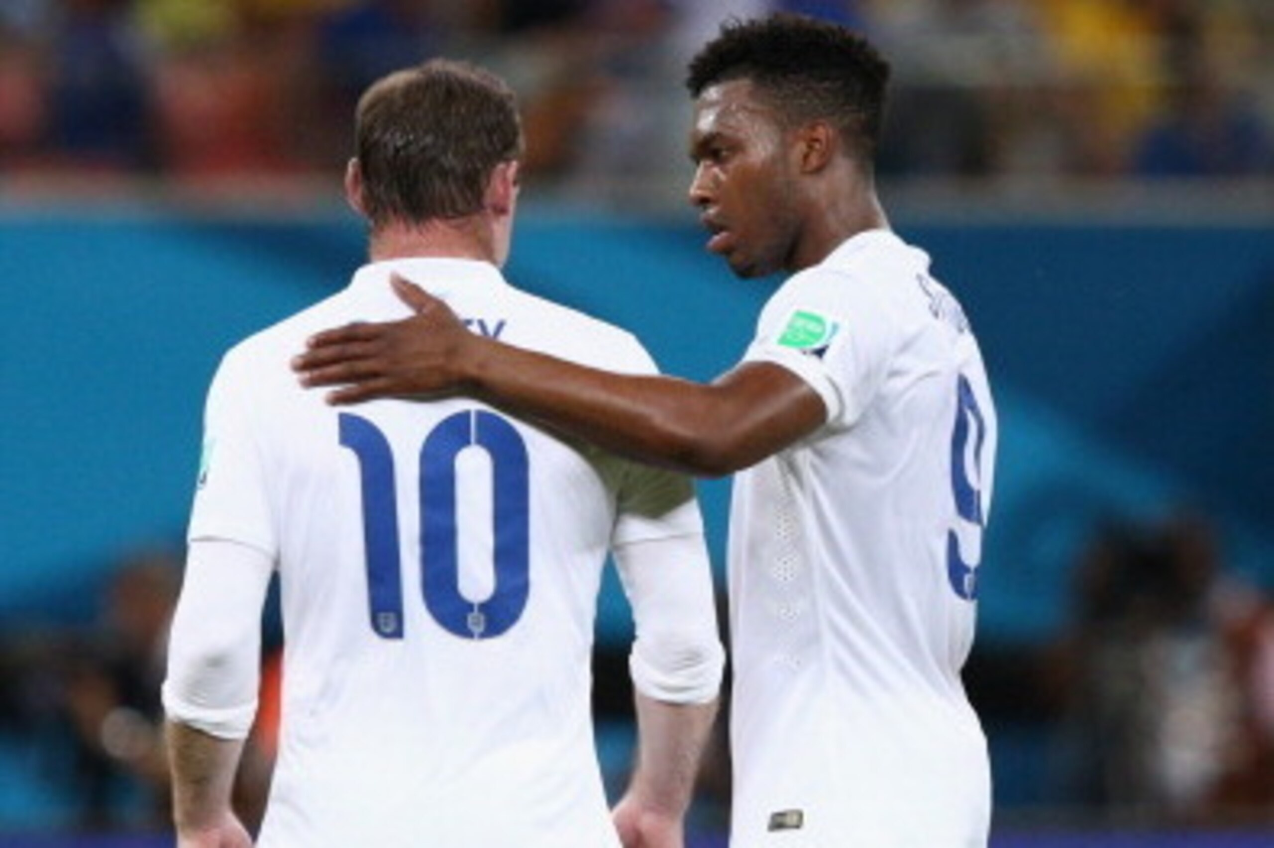 MANAUS, BRAZIL - JUNE 14:  Daniel Sturridge of England embraces Wayne Rooney during the 2014 FIFA World Cup Brazil Group D match between England and Italy at Arena Amazonia on June 14, 2014 in Manaus, Brazil.  (Photo by Adam Pretty/Getty Images)