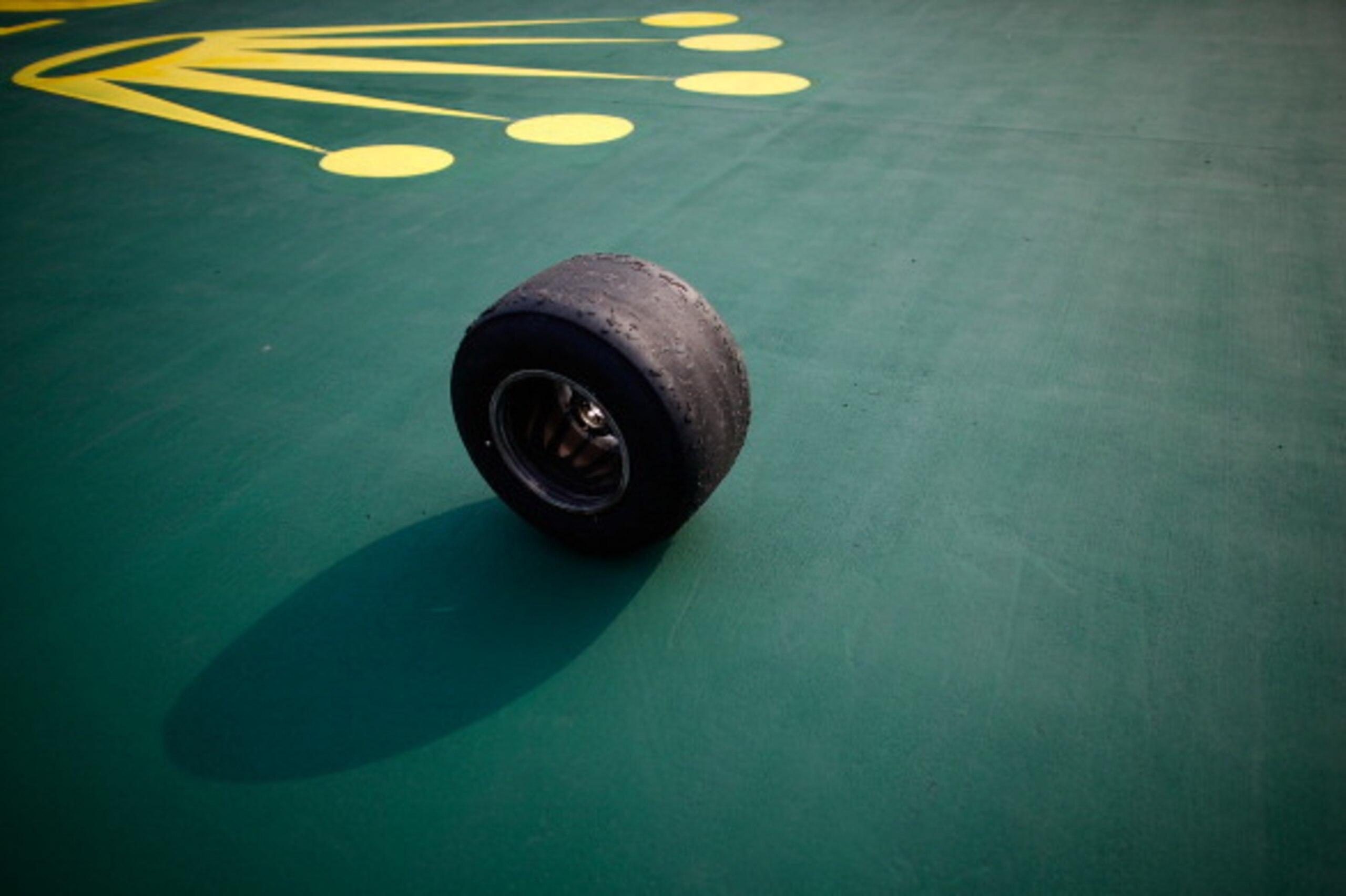 SHANGHAI, CHINA - APRIL 14: Tyre from the car of Mark Webber of Australia and Infiniti Red Bull Racing sits on the ground during the Chinese Formula One Grand Prix at the Shanghai International Circuit on April 14, 2013 in Shanghai, China.  (Photo by Vlad