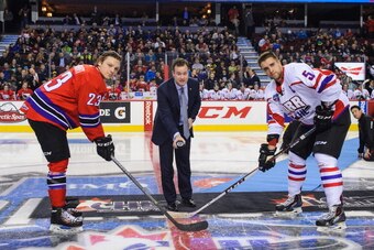 CALGARY, AB - JANUARY 15: Sam Reinhart #23 of Team Cherry lines up for the ceremonial face-off against Aaron Ekblad #5 of Team Orr during the CHL Top Prospects game at Scotiabank Saddledome on January 15, 2014 in Calgary, Alberta, Canada. (Photo by Derek 