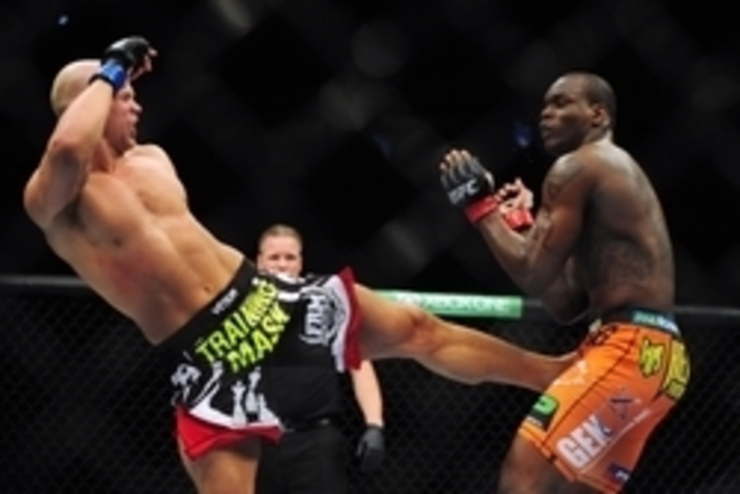 Jun 14, 2014; Vancouver, British Columbia, Canada; Ovince Saint Preux (red) fights against Ryan Jimmo (blue) in their light heavyweight bout for UFC 174 at Rogers Arena. Mandatory Credit: Anne-Marie Sorvin-USA TODAY Sports