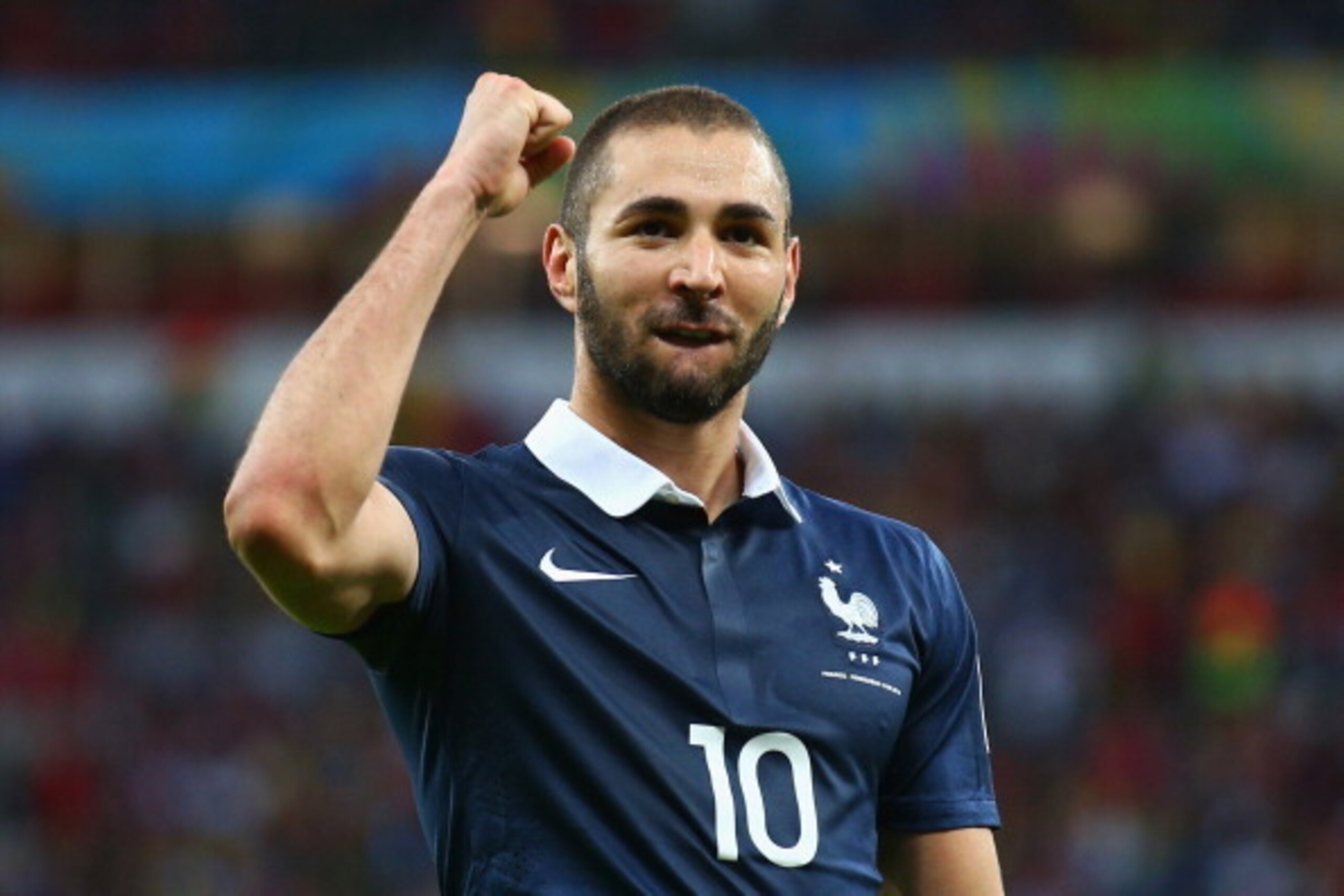 PORTO ALEGRE, BRAZIL - JUNE 15:  Karim Benzema of France celebrates after scoring his team's third goal during the 2014 FIFA World Cup Brazil Group E match between France and Honduras at Estadio Beira-Rio on June 15, 2014 in Porto Alegre, Brazil.  (Photo 