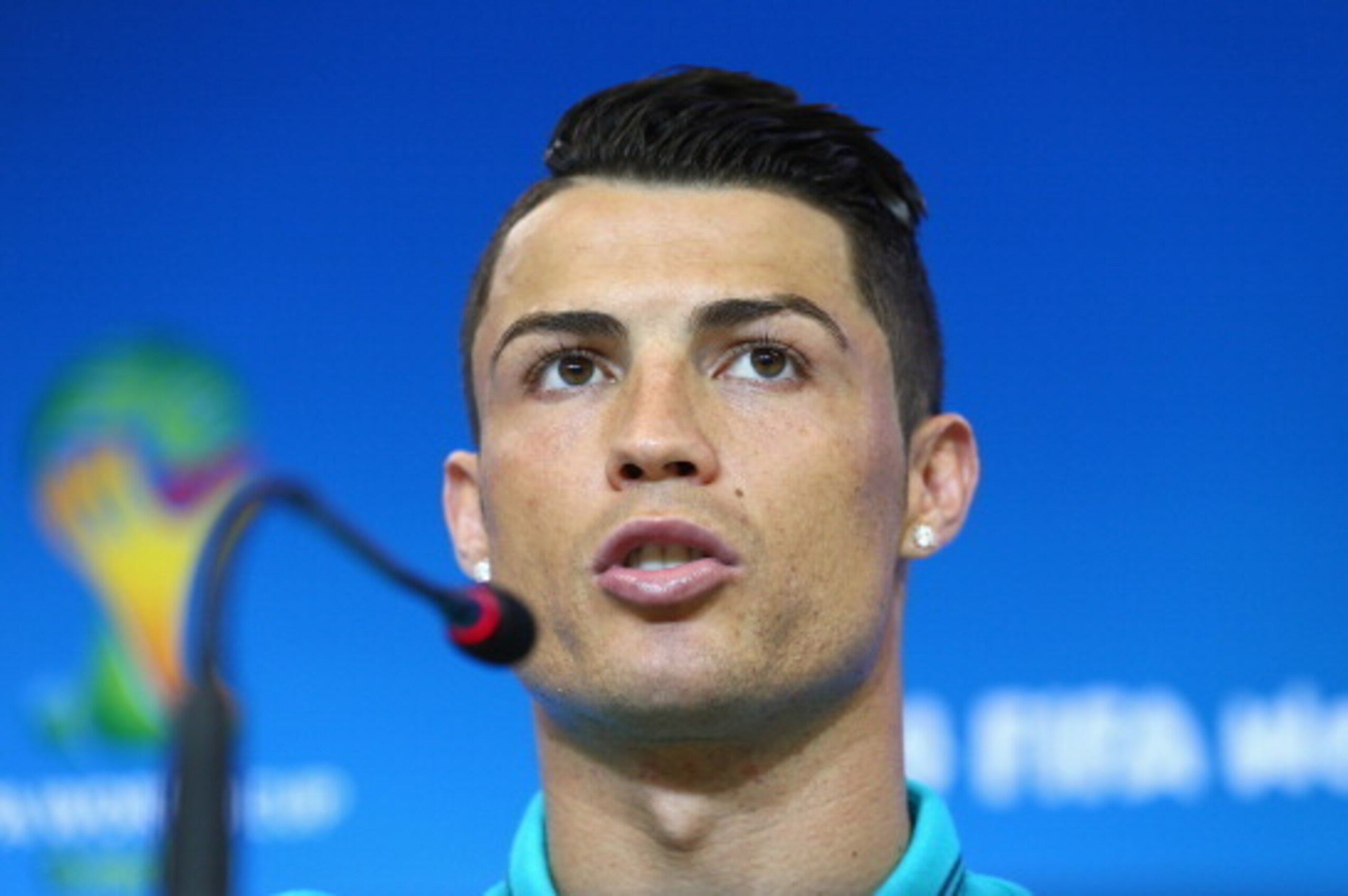 SALVADOR, BRAZIL - JUNE 15:  Cristiano Ronaldo talks to the media during the Portugal press conference ahead of the 2014 FIFA World Cup Group G match between Germany and Portugal held at the Arena Fonte Novaon June 15, 2014 in Salvador, Brazil.  (Photo by