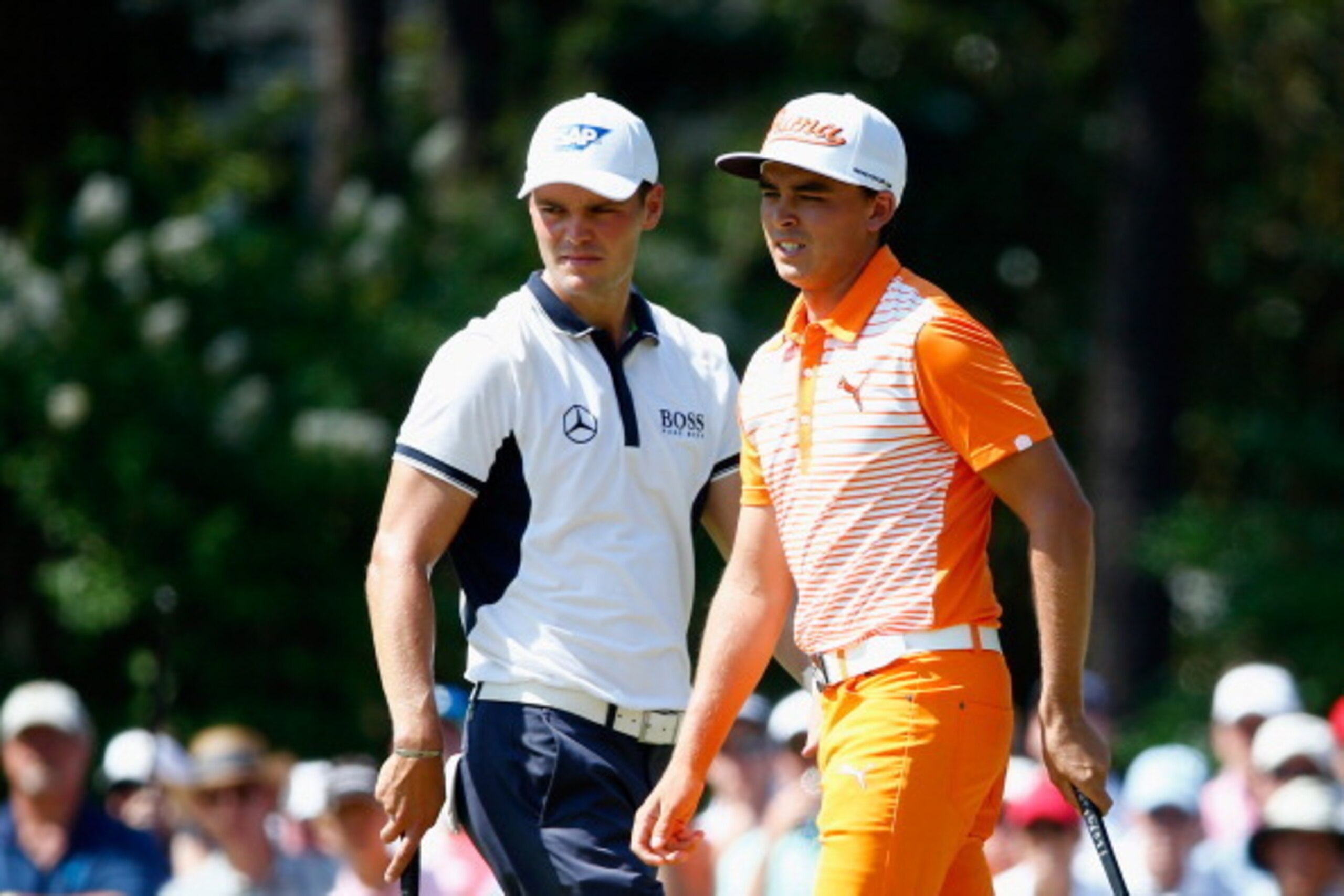 PINEHURST, NC - JUNE 15: (L-R) Martin Kaymer of Germany and Rickie Fowler of the United States look on from the second green during the final round of the 114th U.S. Open at Pinehurst Resort & Country Club, Course No. 2 on June 15, 2014 in Pinehurst, Nor PINEHURST, NC - JUNE 15: (L-R) Martin Kaymer of Germany and Rickie Fowler of the United States look on from the second green during the final round of the 114th U.S. Open at Pinehurst Resort & Country Club, Course No. 2 on June 15, 2014 in Pinehurst, Nor