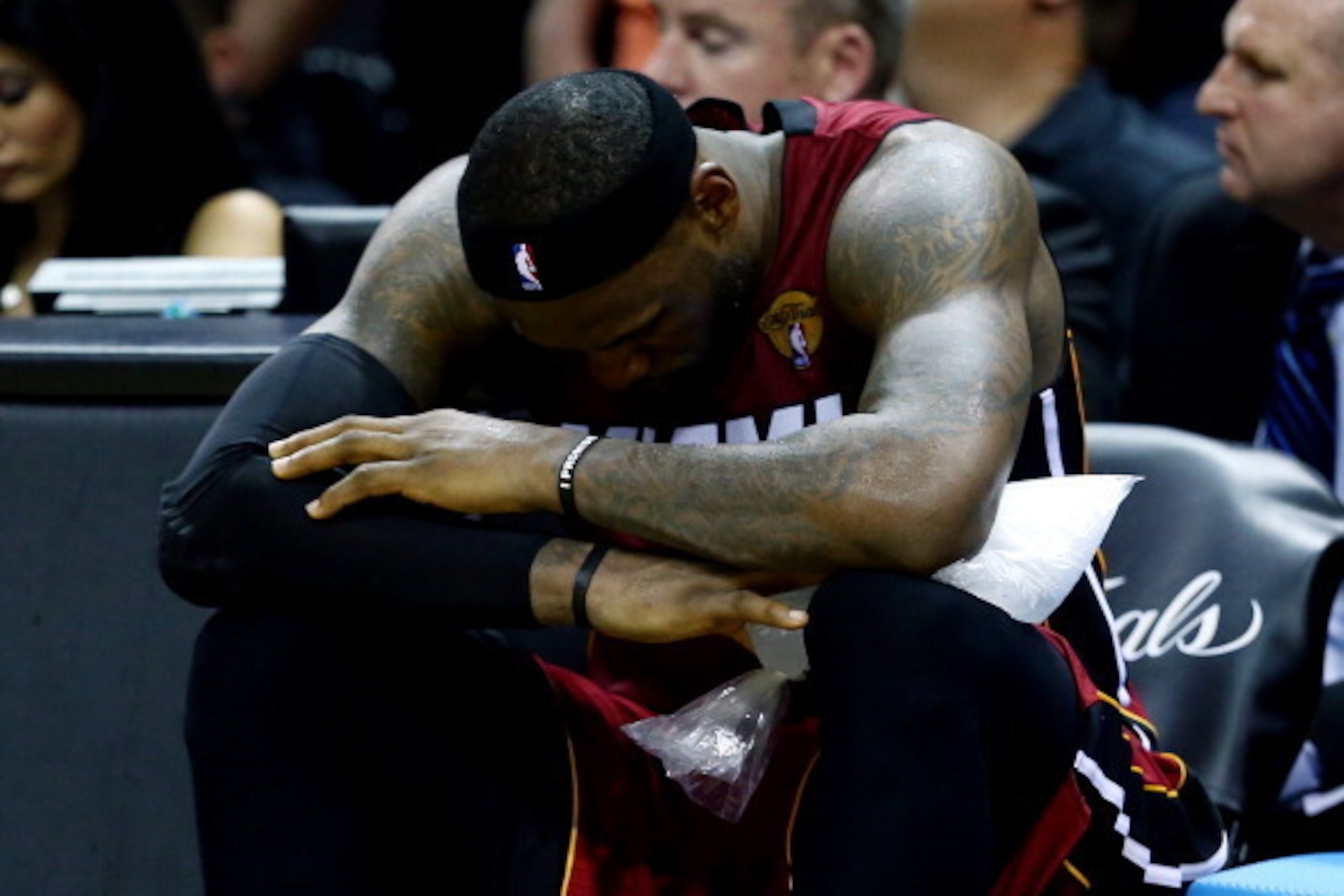 SAN ANTONIO, TX - JUNE 05: LeBron James #6 of the Miami Heat sits on the bench after leaving the game in the fourth quarter with cramps against the San Antonio Spurs during Game One of the 2014 NBA Finals at the AT&T Center on June 5, 2014 in San Antonio SAN ANTONIO, TX - JUNE 05: LeBron James #6 of the Miami Heat sits on the bench after leaving the game in the fourth quarter with cramps against the San Antonio Spurs during Game One of the 2014 NBA Finals at the AT&T Center on June 5, 2014 in San Antonio