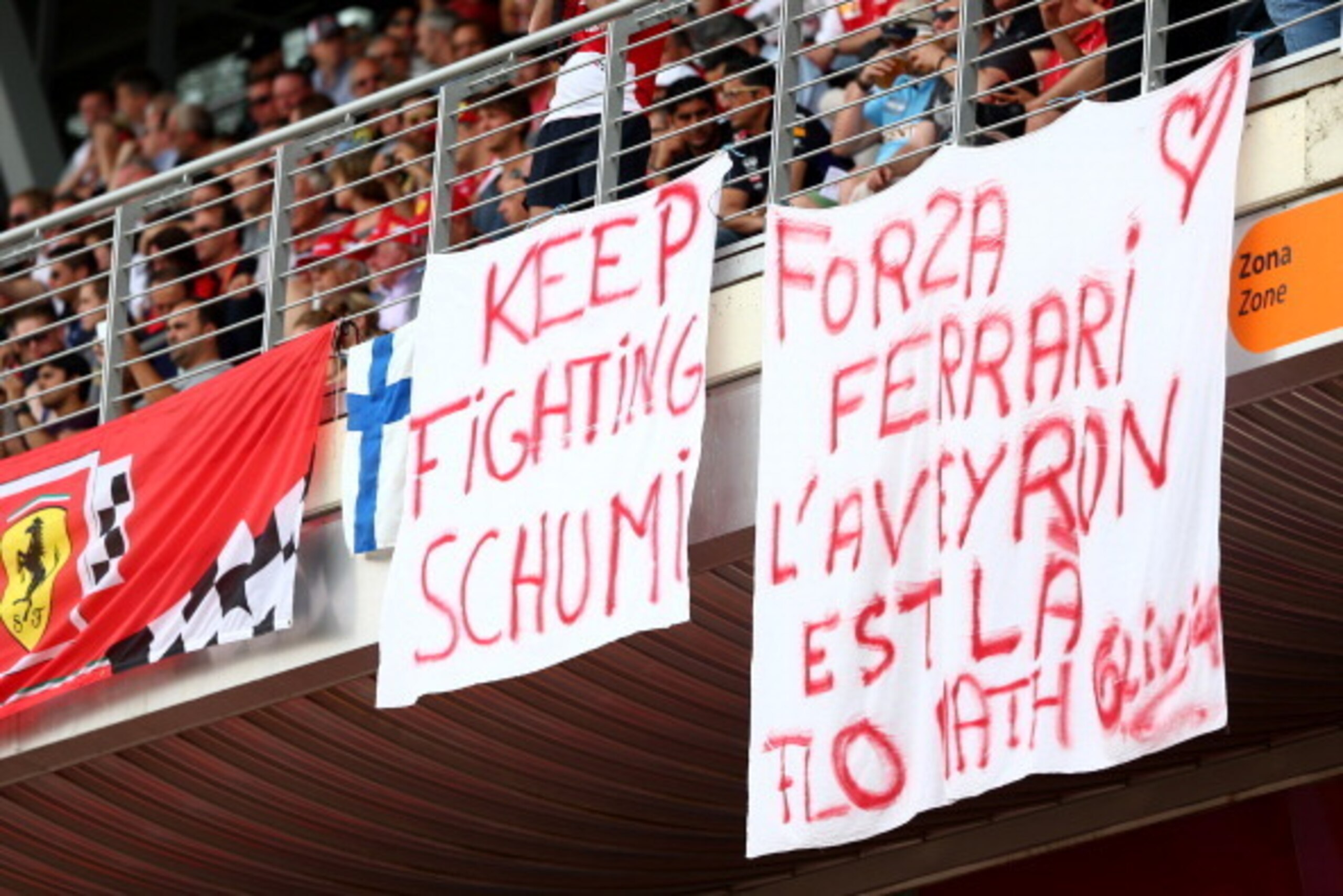 MONTMELO, SPAIN - MAY 11:  A banner displaying the message 'keep fighting Schumi' for hospitalised former F1 driver Michael Schumacher hangs from the grandstand during the Spanish Formula One Grand Prix at Circuit de Catalunya on May 11, 2014 in Montmelo,