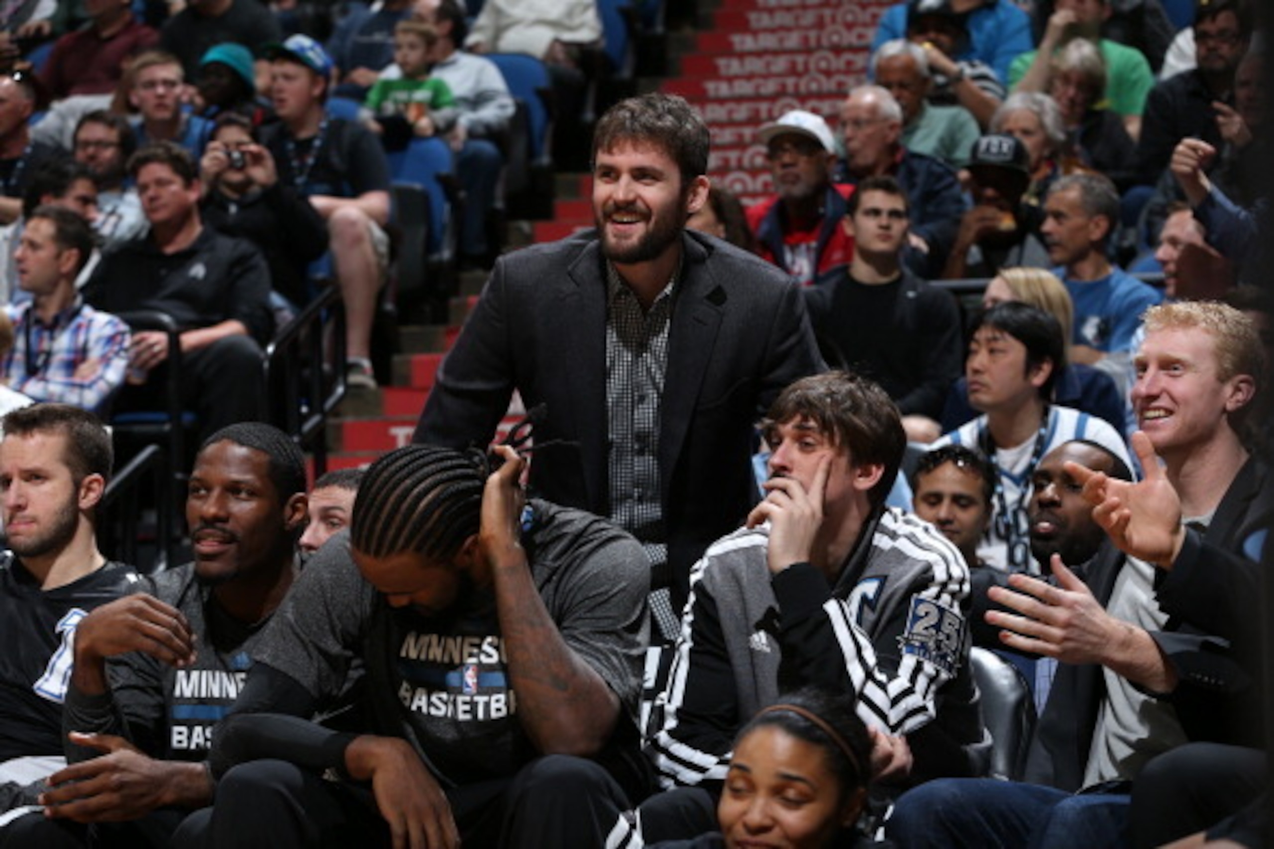 MINNEAPOLIS, MN - April 11: Kevin Love #42 of the Minnesota Timberwolves looks on from the bench with teammates during the game against the Houston Rockets on April 11, 2014 at Target Center in Minneapolis, Minnesota. NOTE TO USER: User expressly acknowle