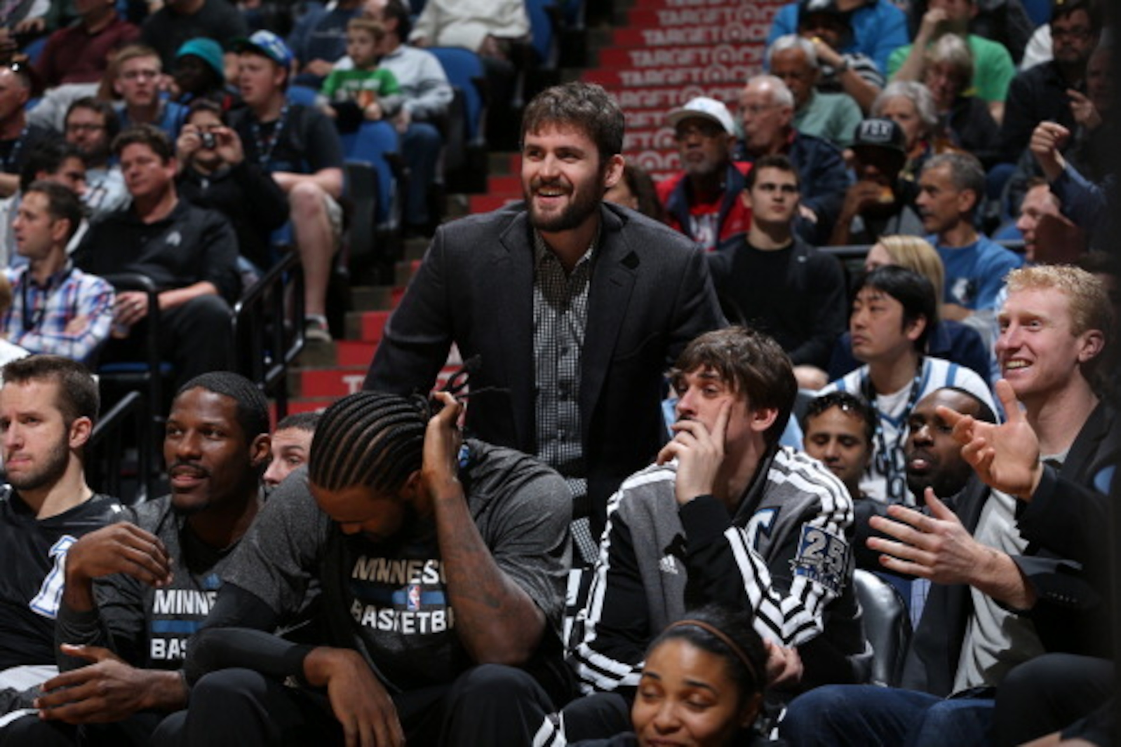 MINNEAPOLIS, MN - April 11: Kevin Love #42 of the Minnesota Timberwolves looks on from the bench with teammates during the game against the Houston Rockets on April 11, 2014 at Target Center in Minneapolis, Minnesota. NOTE TO USER: User expressly acknowle