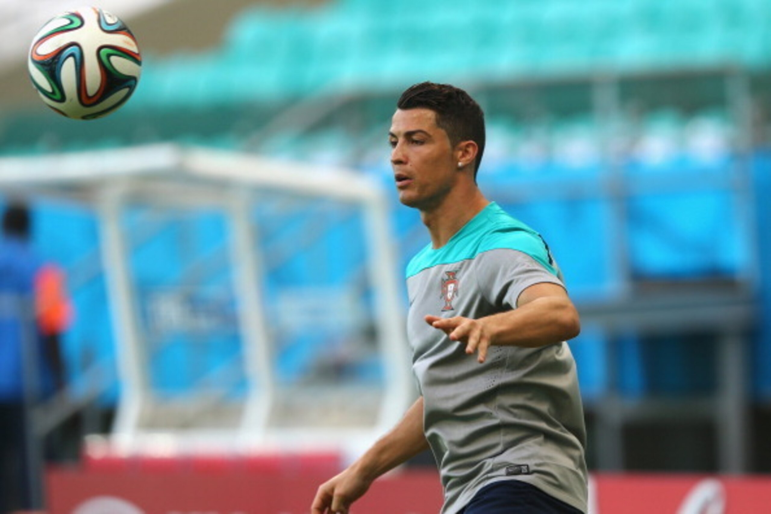 SALVADOR, BRAZIL - JUNE 15:  Cristiano Ronaldo in action during the Portugal training session ahead of the 2014 FIFA World Cup Group G match between Germany and Portugal held at the Arena Fonte Nova on June 15, 2014 in Salvador, Brazil.  (Photo by Martin 