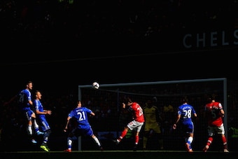 LONDON, ENGLAND - MARCH 22:  Nemanja Matic of Chelsea and Mathieu Flamini of Arsenal compete for the ball during the Barclays Premier League match between Chelsea and Arsenal at Stamford Bridge on March 22, 2014 in London, England.  (Photo by Richard Heat