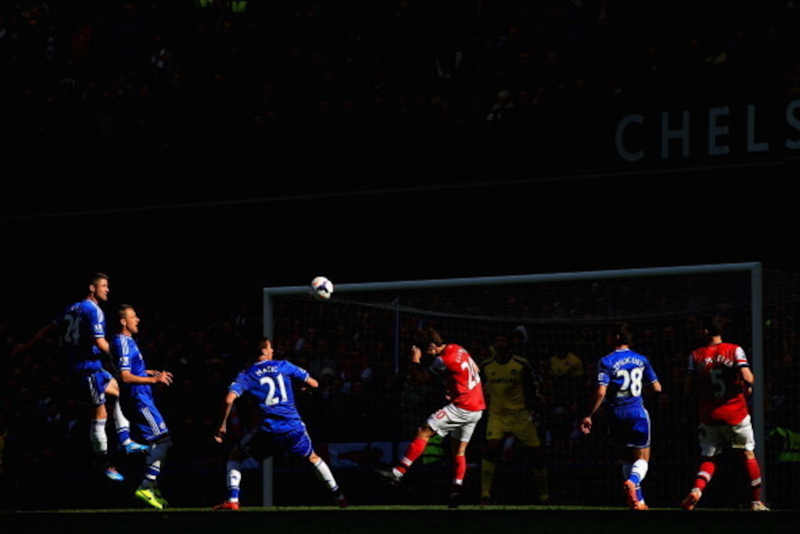 LONDON, ENGLAND - MARCH 22:  Nemanja Matic of Chelsea and Mathieu Flamini of Arsenal compete for the ball during the Barclays Premier League match between Chelsea and Arsenal at Stamford Bridge on March 22, 2014 in London, England.  (Photo by Richard Heat