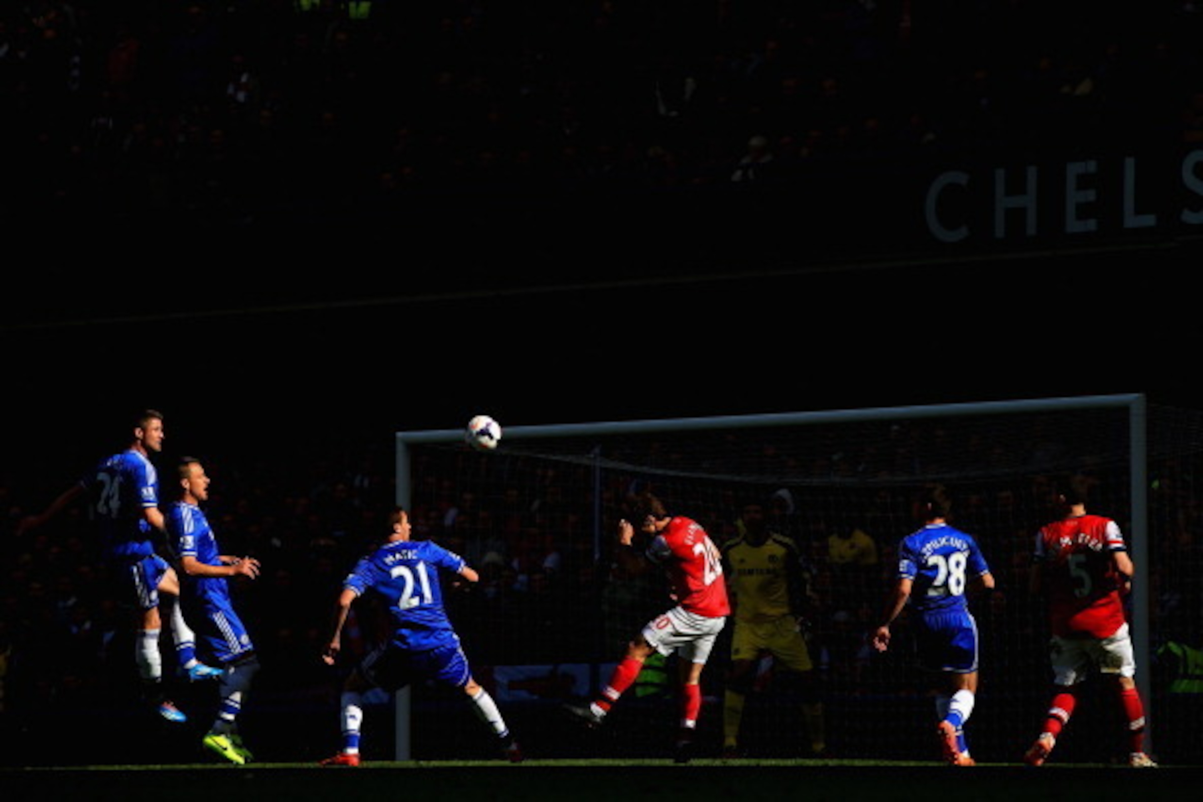 LONDON, ENGLAND - MARCH 22:  Nemanja Matic of Chelsea and Mathieu Flamini of Arsenal compete for the ball during the Barclays Premier League match between Chelsea and Arsenal at Stamford Bridge on March 22, 2014 in London, England.  (Photo by Richard Heat