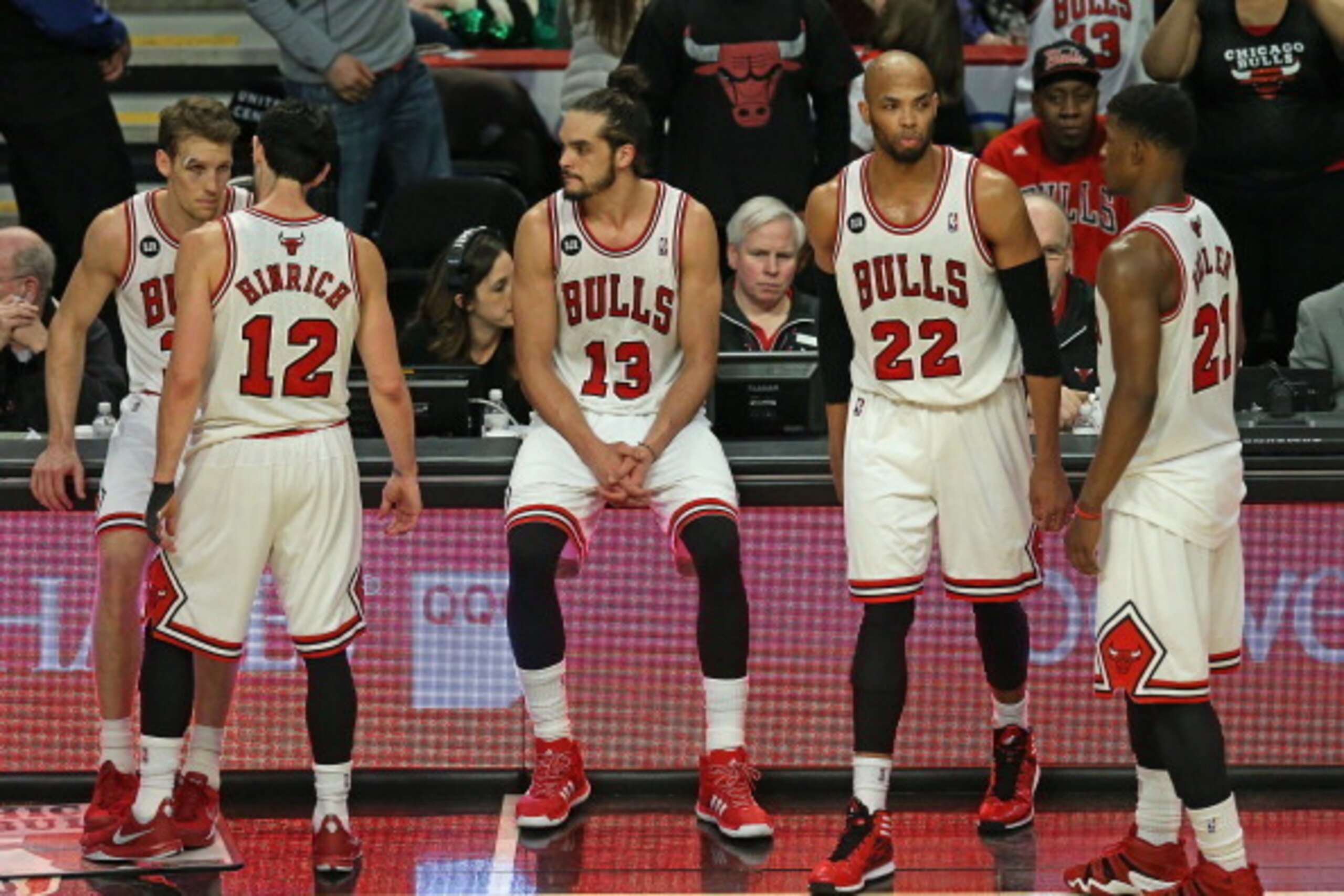 CHICAGO, IL - MARCH 15:  (L-R) Mike Dunleavy #34, Kirk Hinrich #12, Joakim Noah #13, Taj Gibson #22 and Jimmy Butler #21 of the Chicago Bulls wait to reenter a game against the Sacramento Kings after a time out at the United Center on March 15, 2014 in Ch