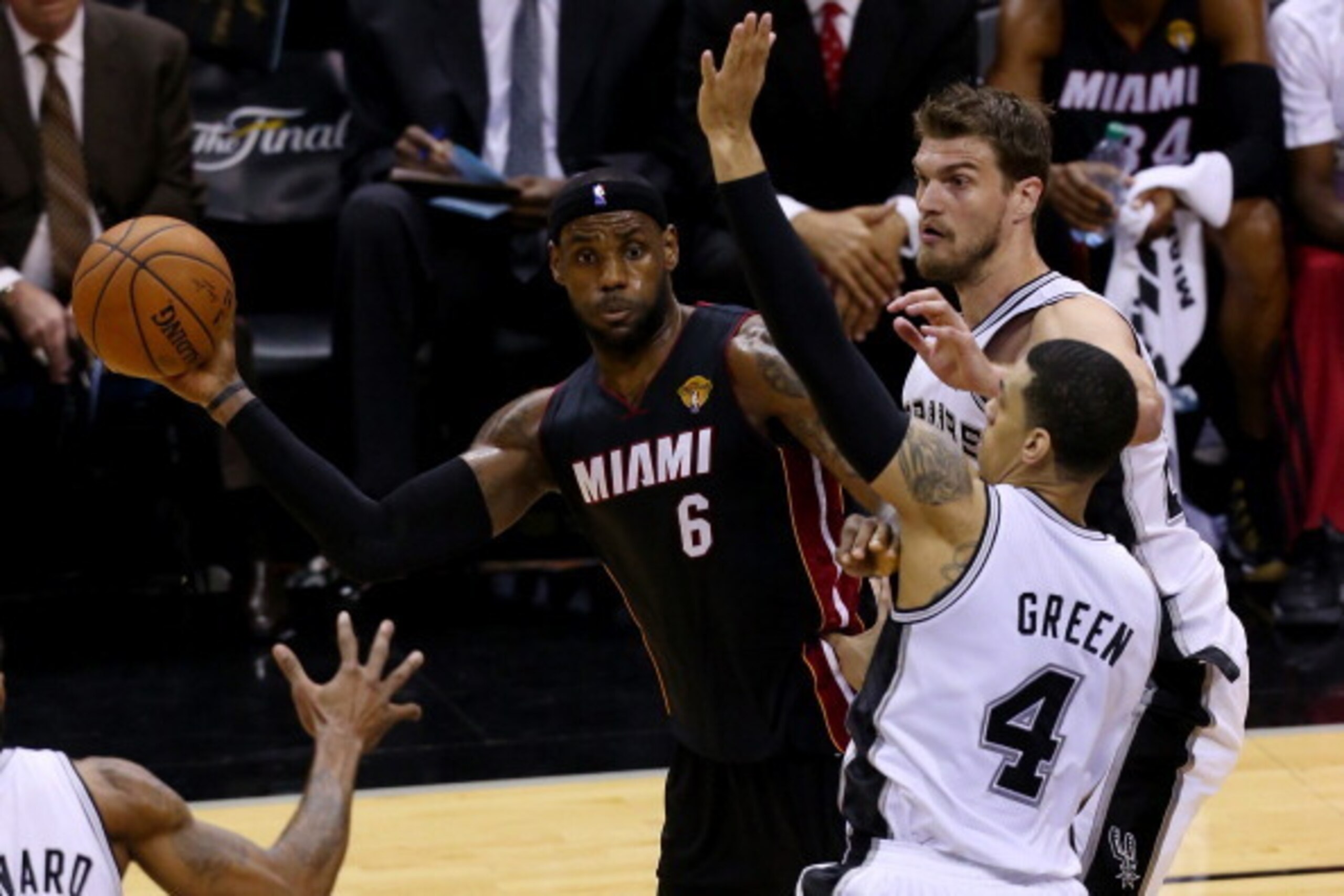 SAN ANTONIO, TX - JUNE 15: LeBron James #6 of the Miami Heat makes a pass as Kawhi Leonard #2, Patty Mills #8, and Tiago Splitter #22 of the San Antonio Spurs defend during Game Five of the 2014 NBA Finals at the AT&T Center on June 15, 2014 in San Anton SAN ANTONIO, TX - JUNE 15: LeBron James #6 of the Miami Heat makes a pass as Kawhi Leonard #2, Patty Mills #8, and Tiago Splitter #22 of the San Antonio Spurs defend during Game Five of the 2014 NBA Finals at the AT&T Center on June 15, 2014 in San Anton