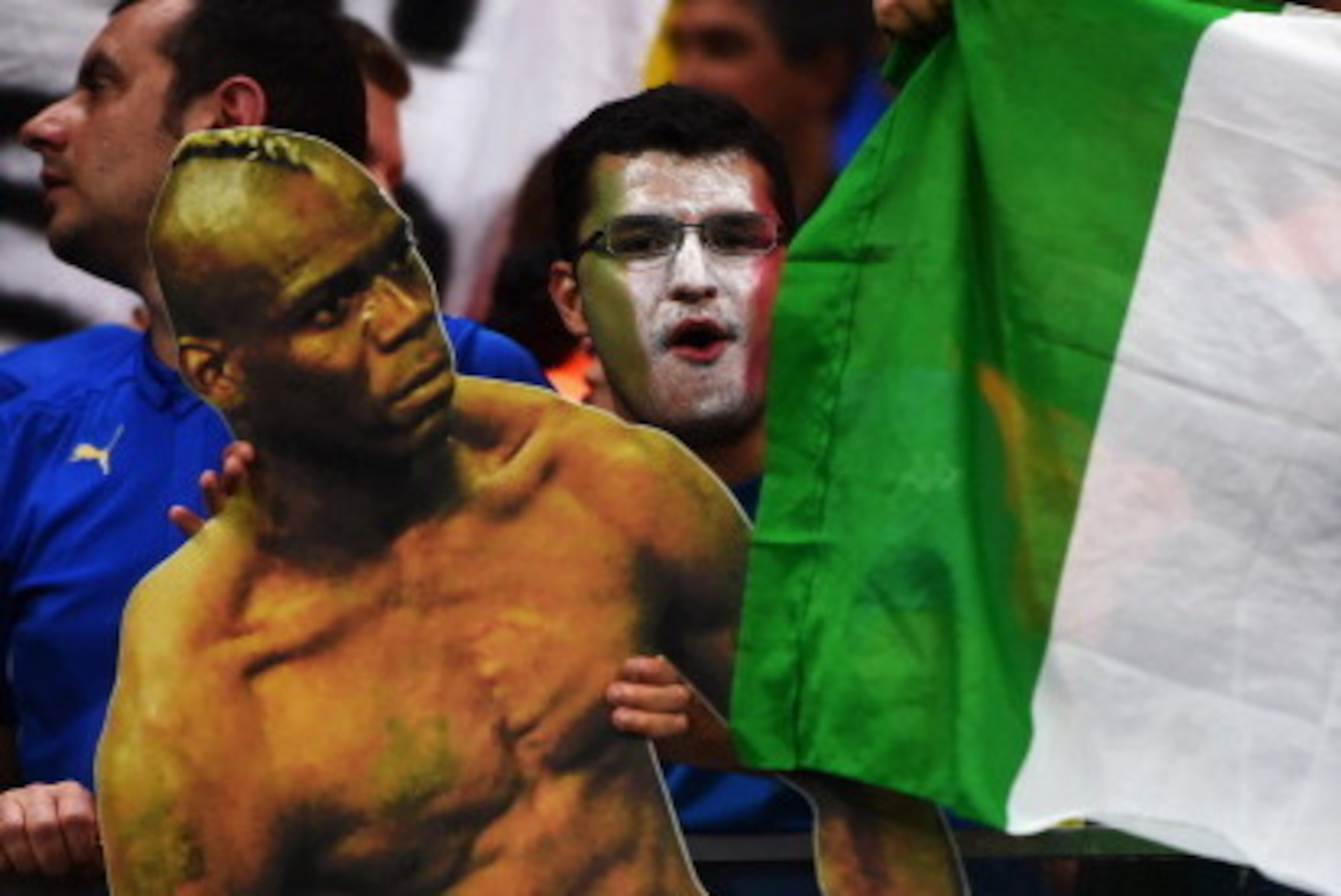 MANAUS, BRAZIL - JUNE 14:  An Italy fan holds a cardboard cutout of Mario Balotelli during the 2014 FIFA World Cup Brazil Group D match between England and Italy at Arena Amazonia on June 14, 2014 in Manaus, Brazil.  (Photo by Christopher Lee/Getty Images