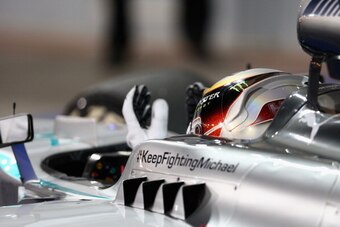 SAKHIR, BAHRAIN - APRIL 06:  Lewis Hamilton of Great Britain and Mercedes GP celebrates in parc ferme after winning the Bahrain Formula One Grand Prix at the Bahrain International Circuit on April 6, 2014 in Sakhir, Bahrain.  (Photo by Paul Gilham/Getty I