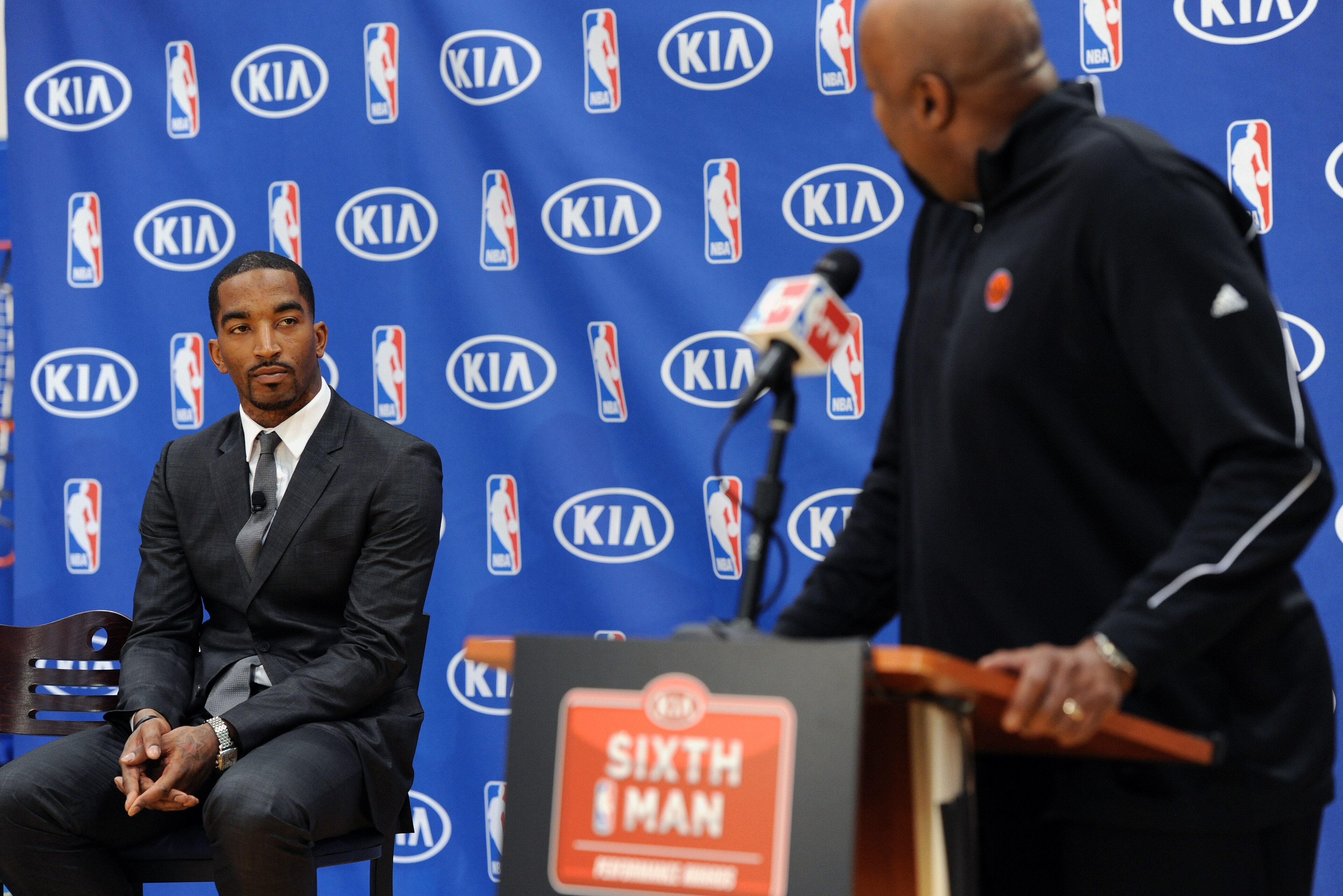TARRYTOWN, NY - APRIL 22: New York Knicks head coach Mike Woodson speaks as J.R Smith #8 of the New York Knicks is the winner of the 2012-13 Kia NBA Sixth Man Award as the league's best player in a reserve role on April 22, 2012 at the Madison Square Gard