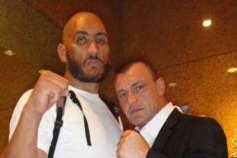 Silva (left) poses with Kozlov.